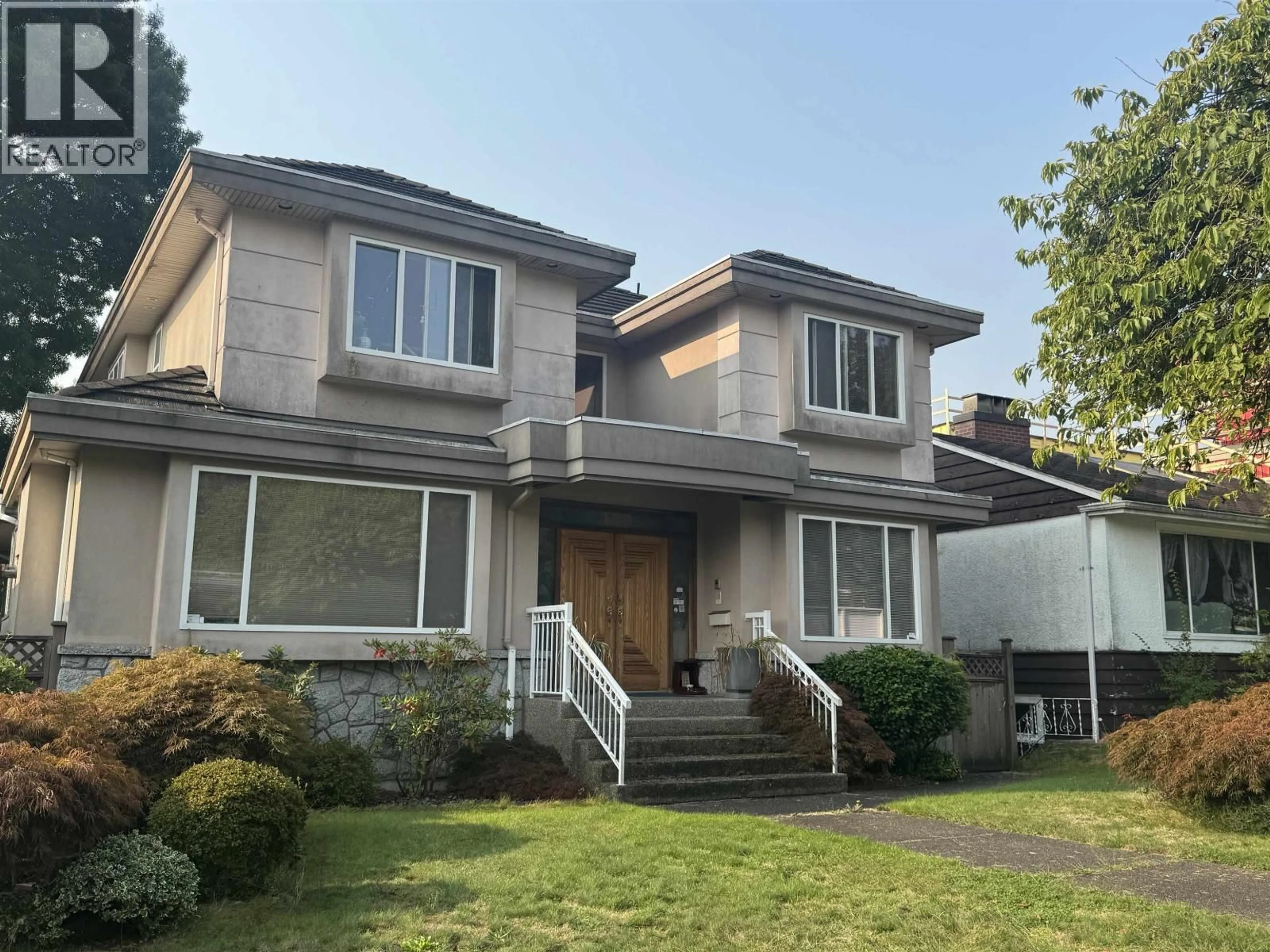 Home with vinyl exterior material, street for 150 44TH AVENUE, Vancouver British Columbia V5Y2V4