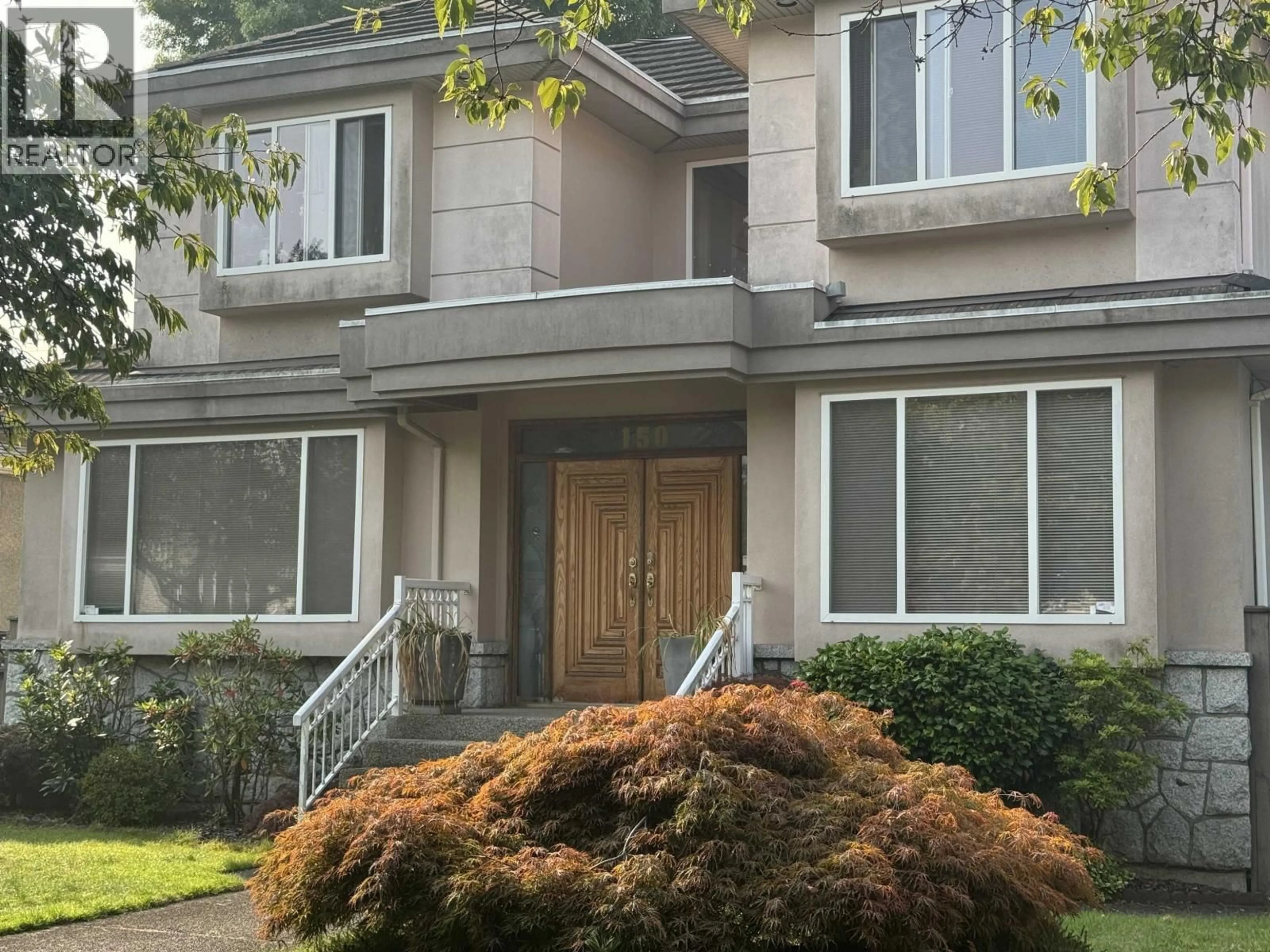 Home with vinyl exterior material, street for 150 44TH AVENUE, Vancouver British Columbia V5Y2V4