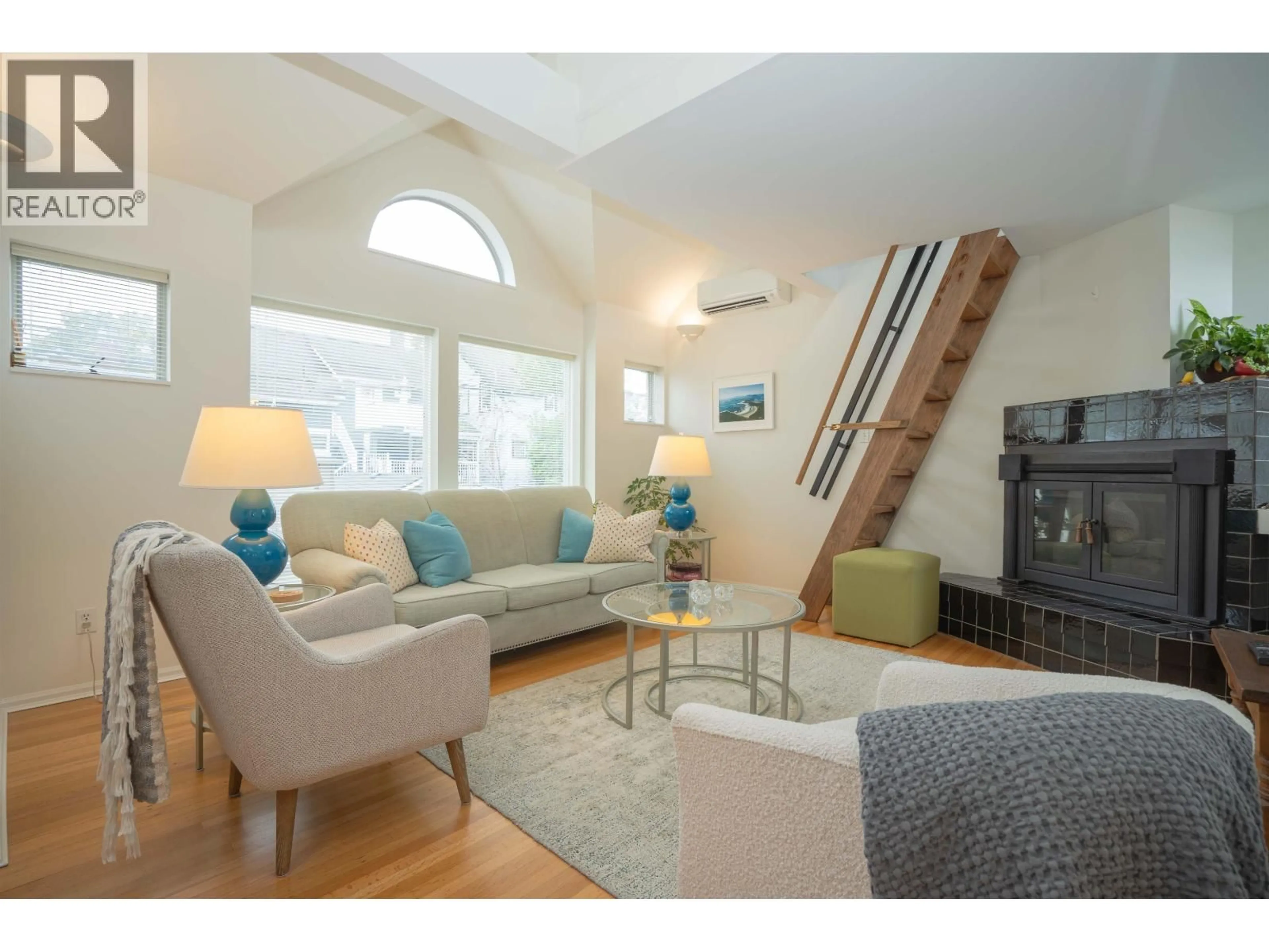 Living room with furniture, wood/laminate floor for 1346 LABURNUM STREET, Vancouver British Columbia V6J3W3