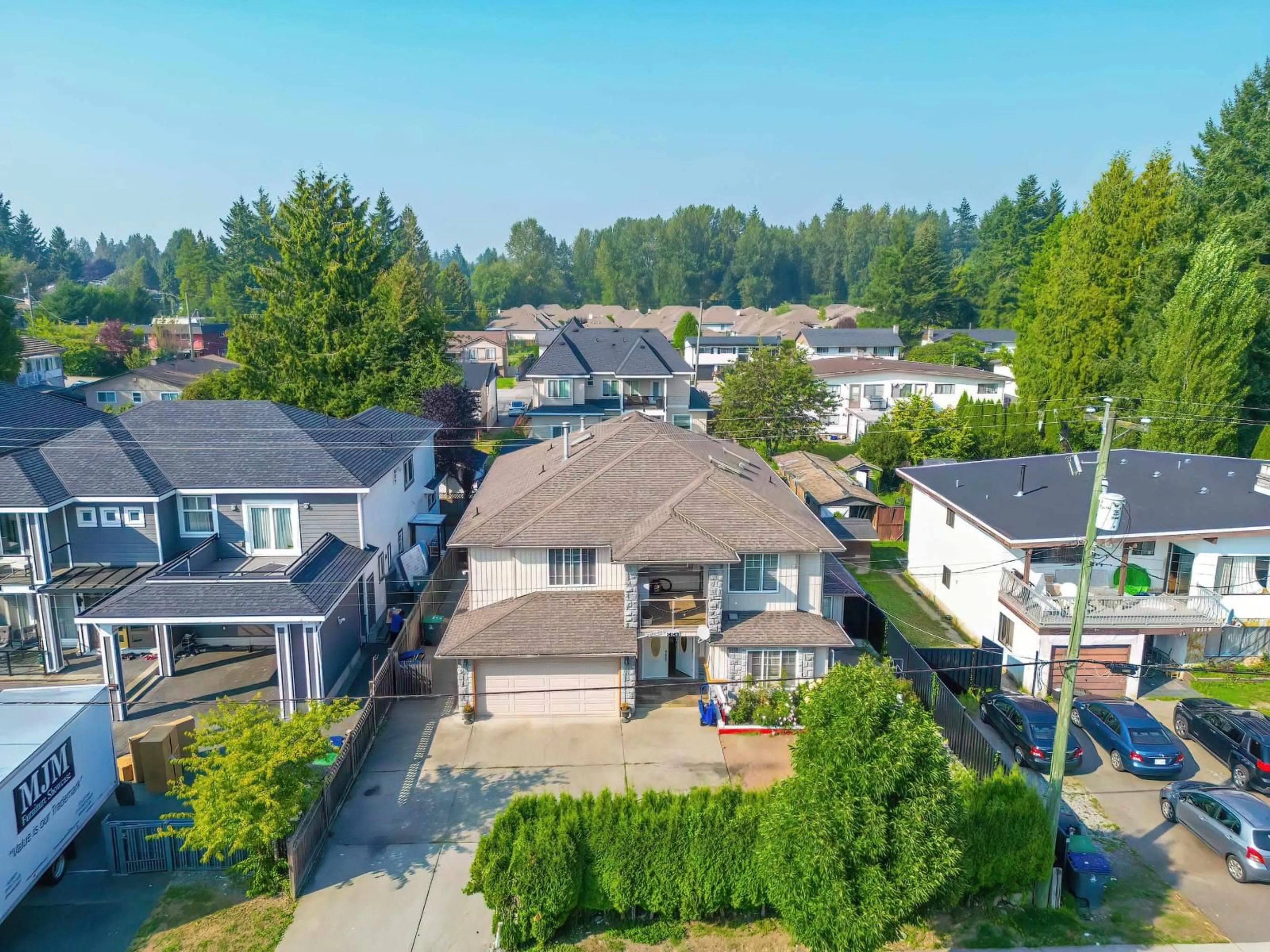 A pic from outside/outdoor area/front of a property/back of a property/a pic from drone, street for 14149 100A, Surrey British Columbia V3T1K6