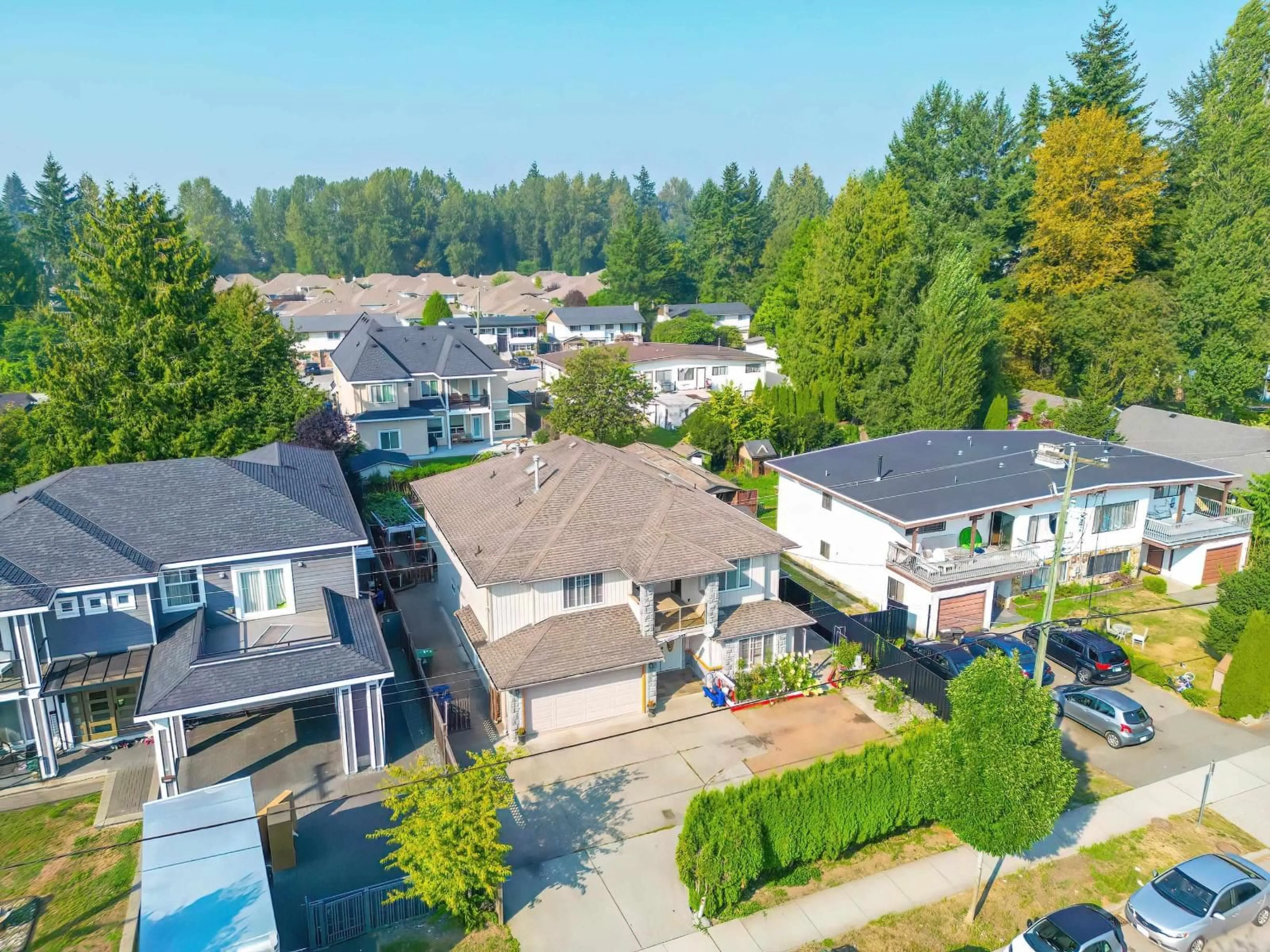 A pic from outside/outdoor area/front of a property/back of a property/a pic from drone, street for 14149 100A, Surrey British Columbia V3T1K6