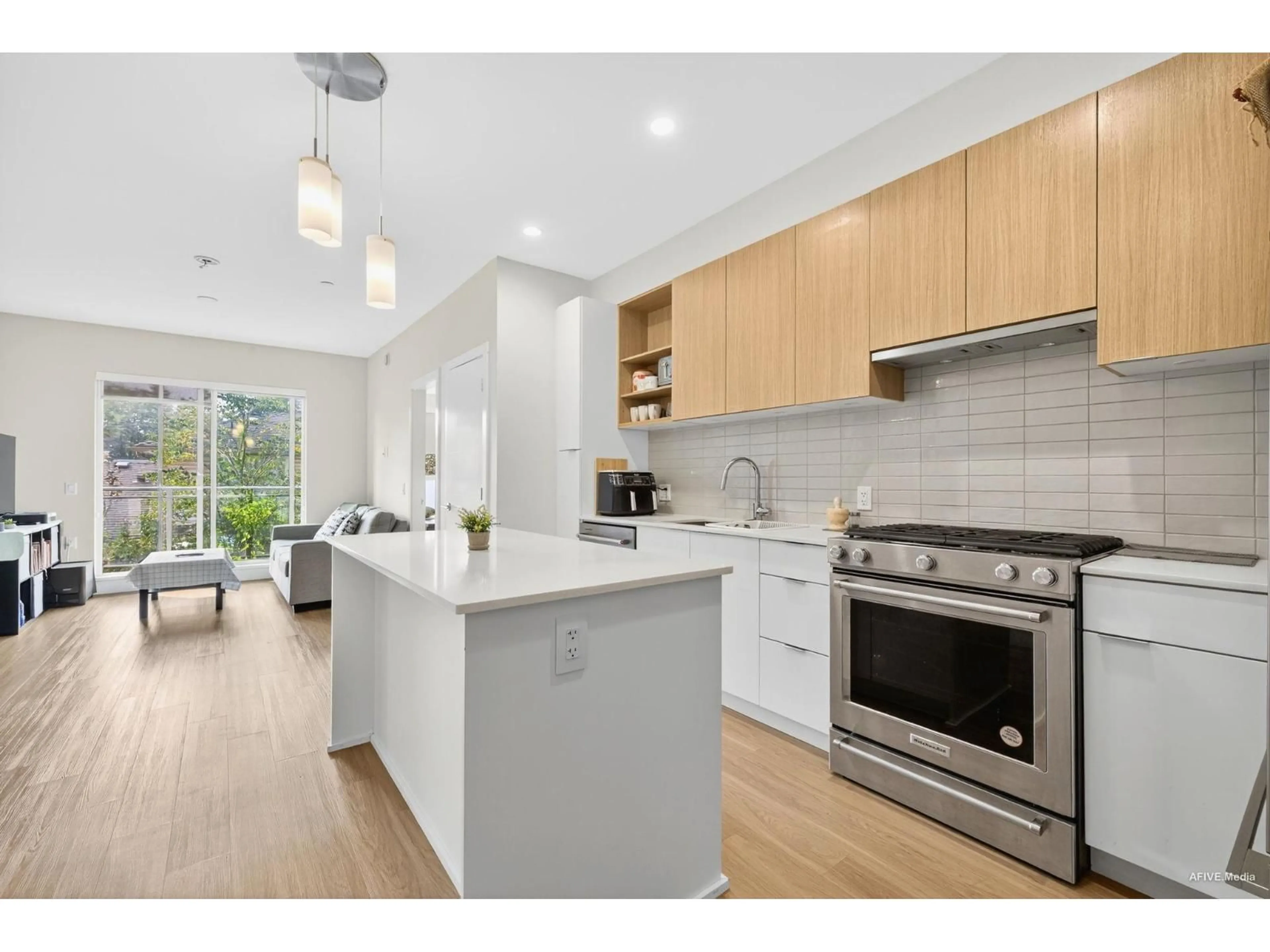 Open concept kitchen, wood/laminate floor for 201 - 6960 NICHOLSON, Delta British Columbia V4E0A9