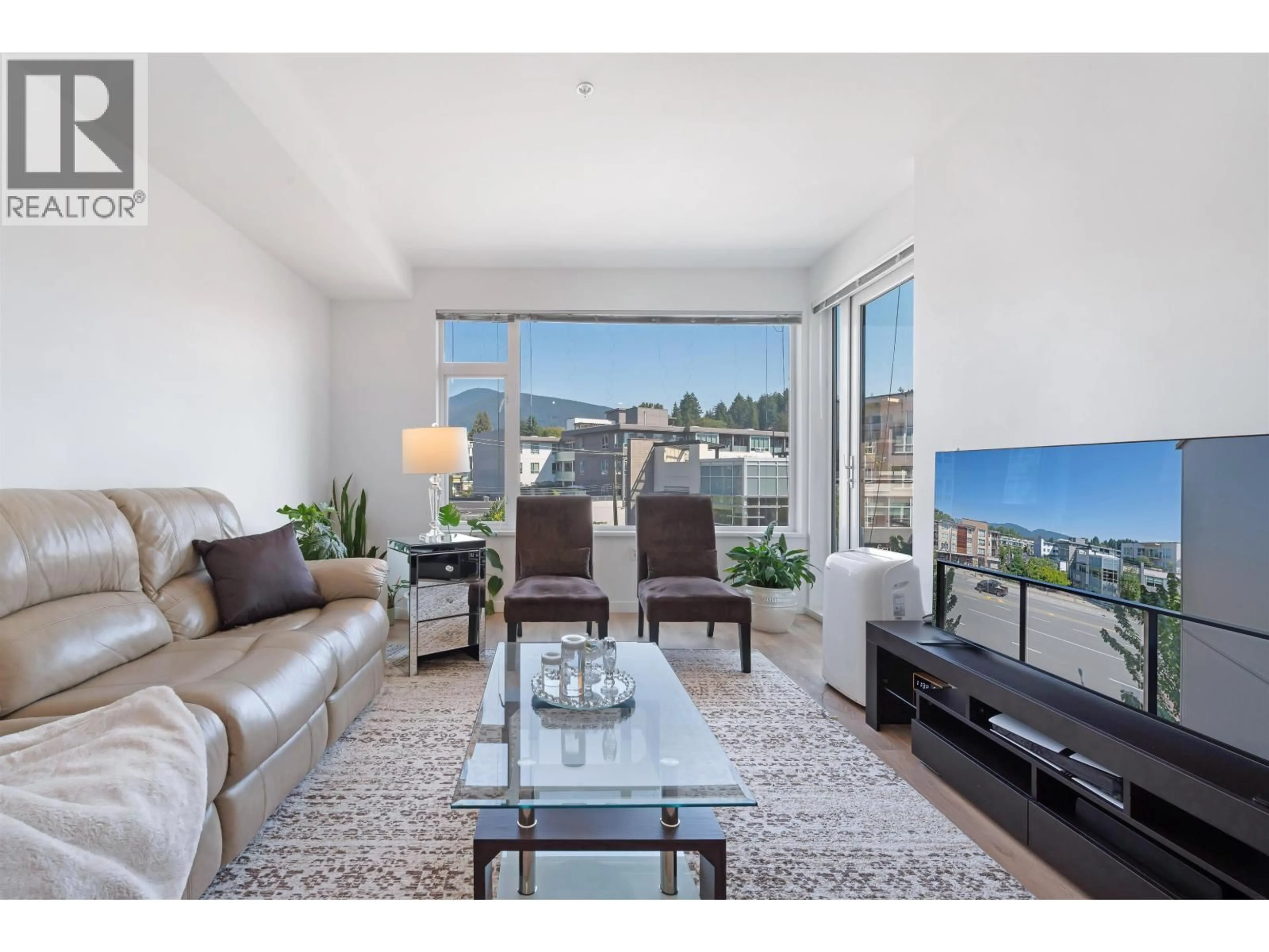 Living room with furniture, unknown for 303 - 725 MARINE DRIVE, Vancouver British Columbia V7M0G2