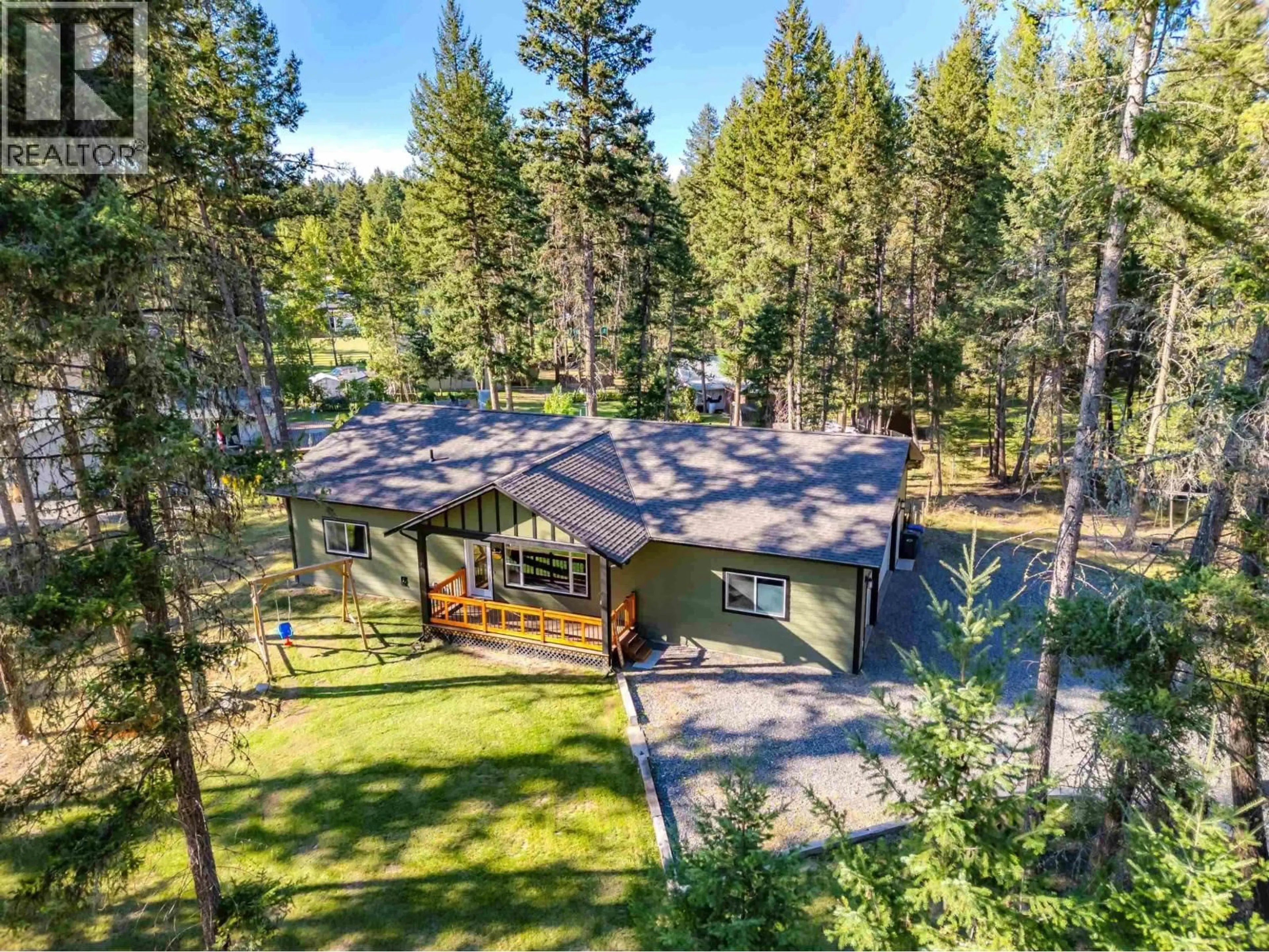 A pic from outside/outdoor area/front of a property/back of a property/a pic from drone, forest/trees view for 5065 KINNCUM ROAD, 108 Mile Ranch British Columbia V0K2Z0