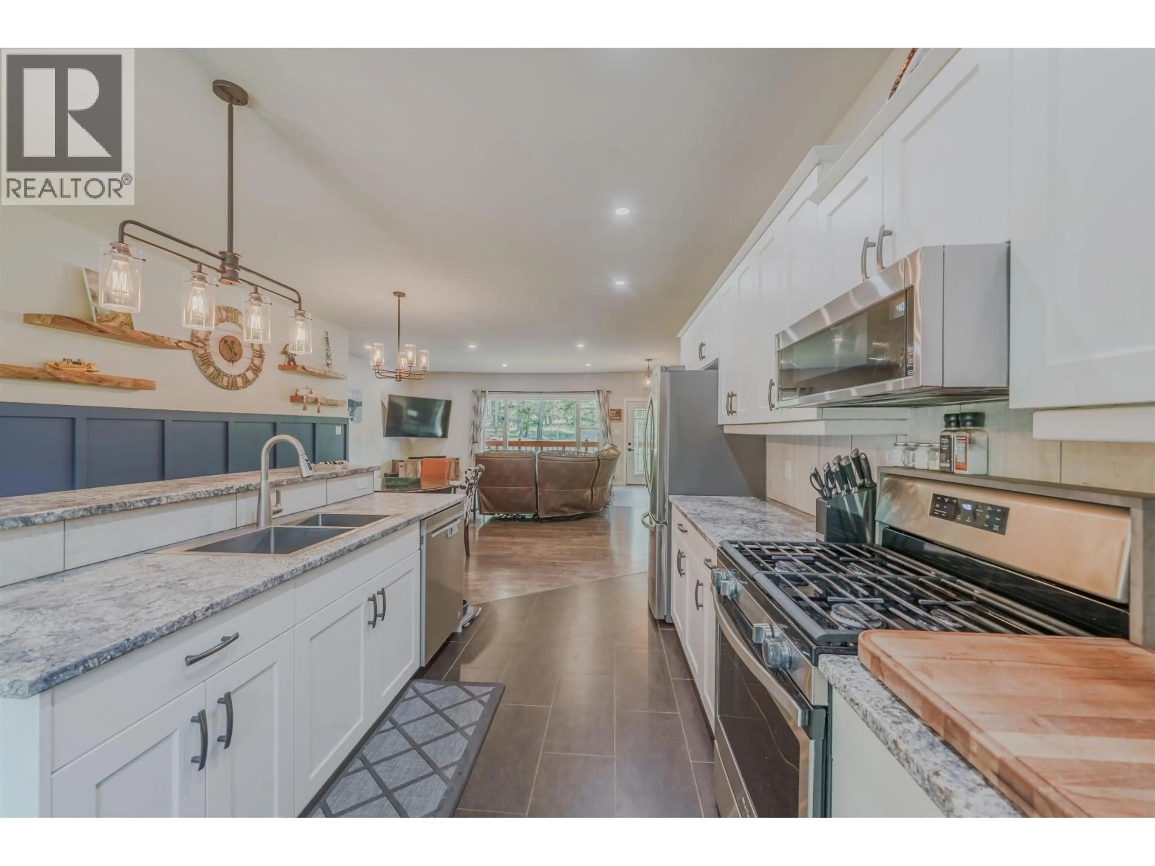 Open concept kitchen, ceramic/tile floor for 5065 KINNCUM ROAD, 108 Mile Ranch British Columbia V0K2Z0