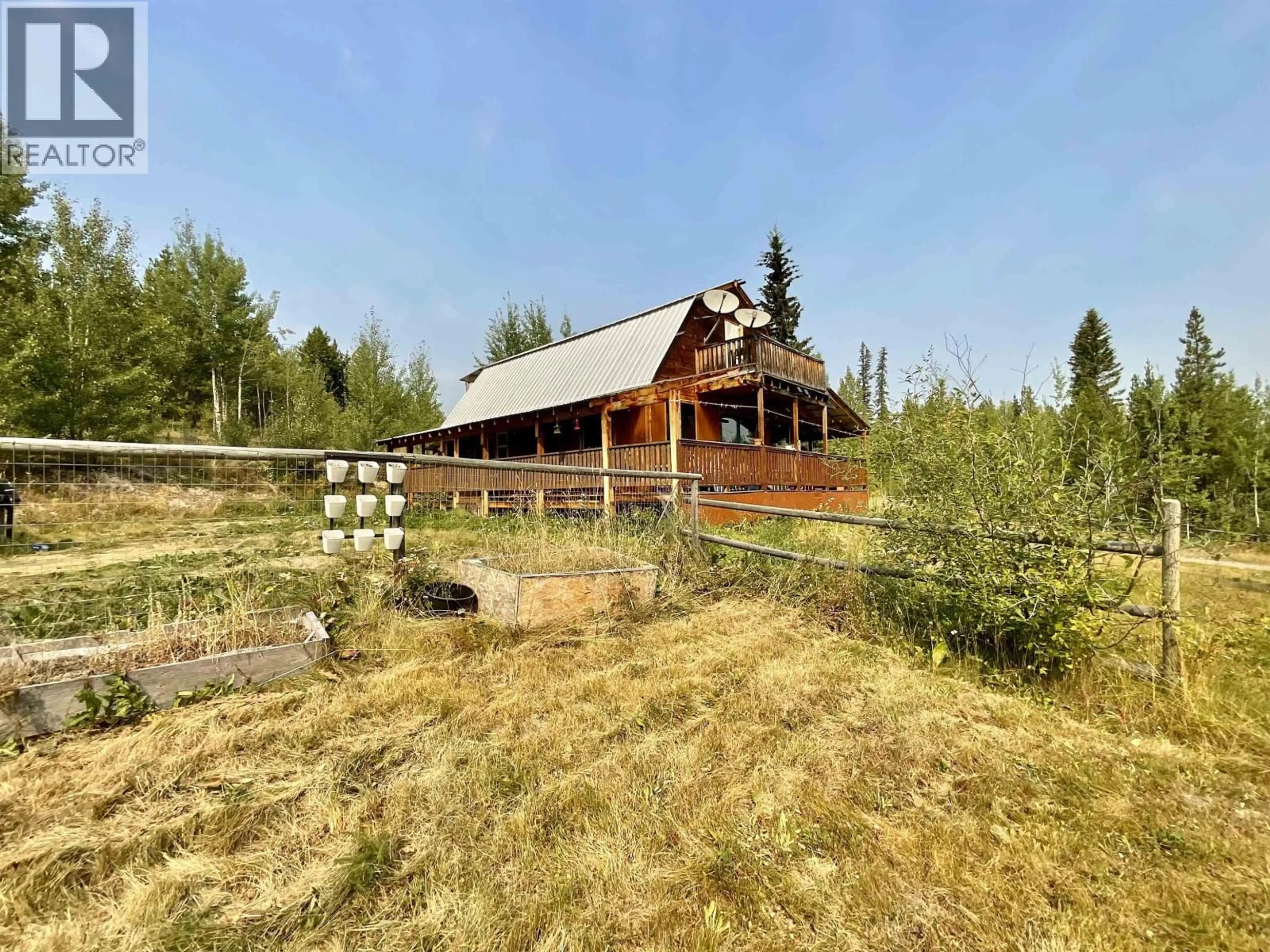 A pic from outside/outdoor area/front of a property/back of a property/a pic from drone, building for 2100 TIBBLES ROAD, Quesnel British Columbia V2J3H9