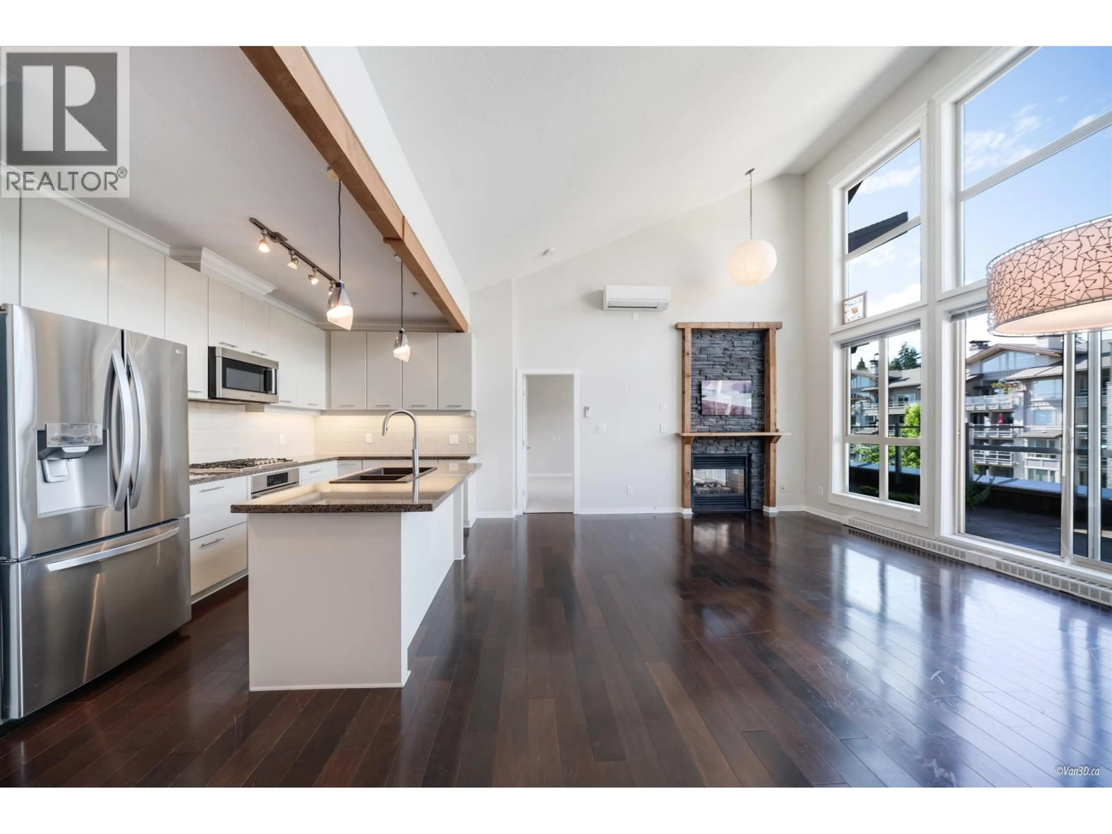 Open concept kitchen, wood/laminate floor for 506 - 530 RAVEN WOODS DRIVE, North Vancouver British Columbia V7G2T5