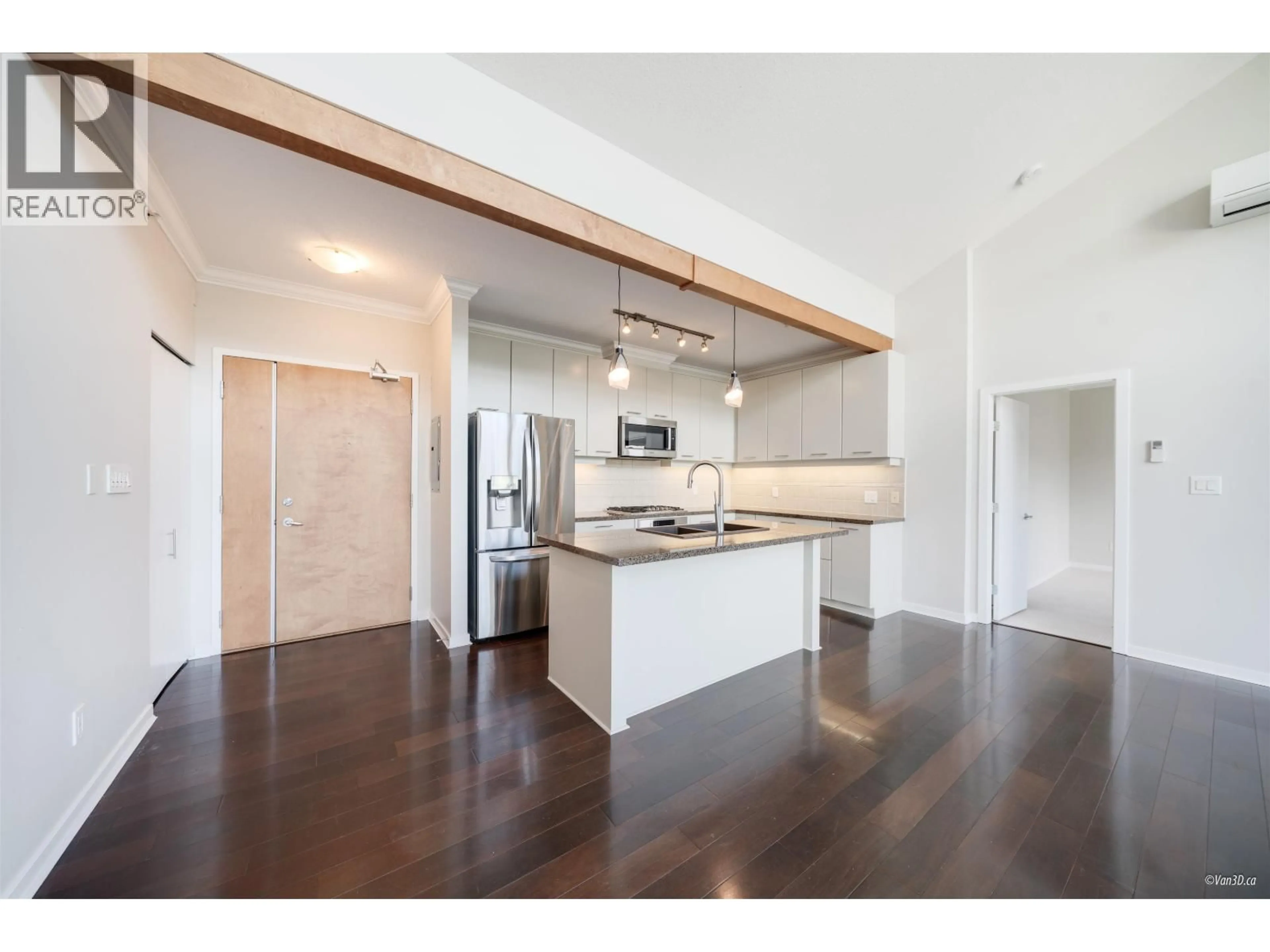 Open concept kitchen, wood/laminate floor for 506 - 530 RAVEN WOODS DRIVE, North Vancouver British Columbia V7G2T5