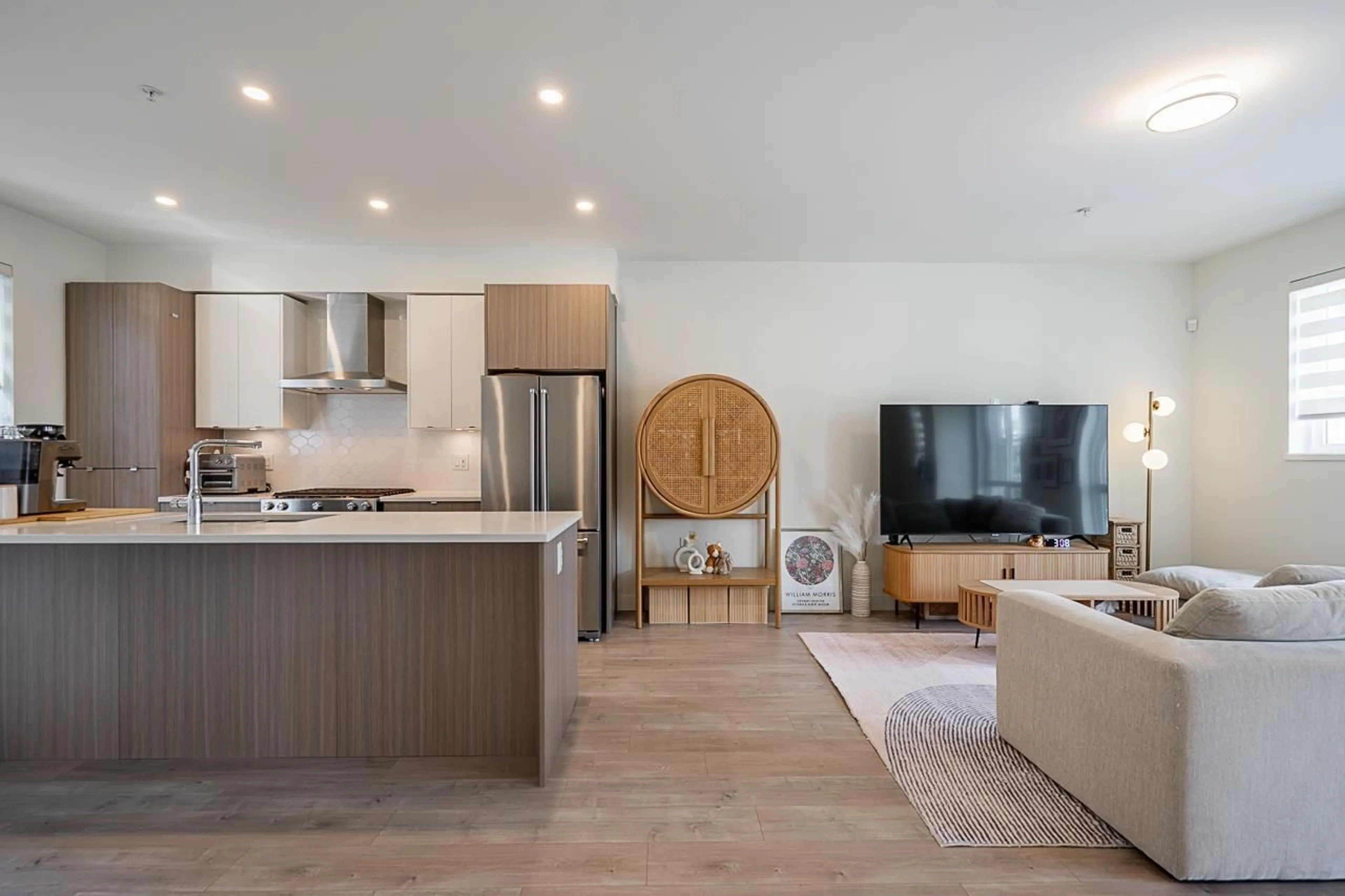 Open concept kitchen, wood/laminate floor for 107 - 7947 209, Langley British Columbia V2Y0Y6