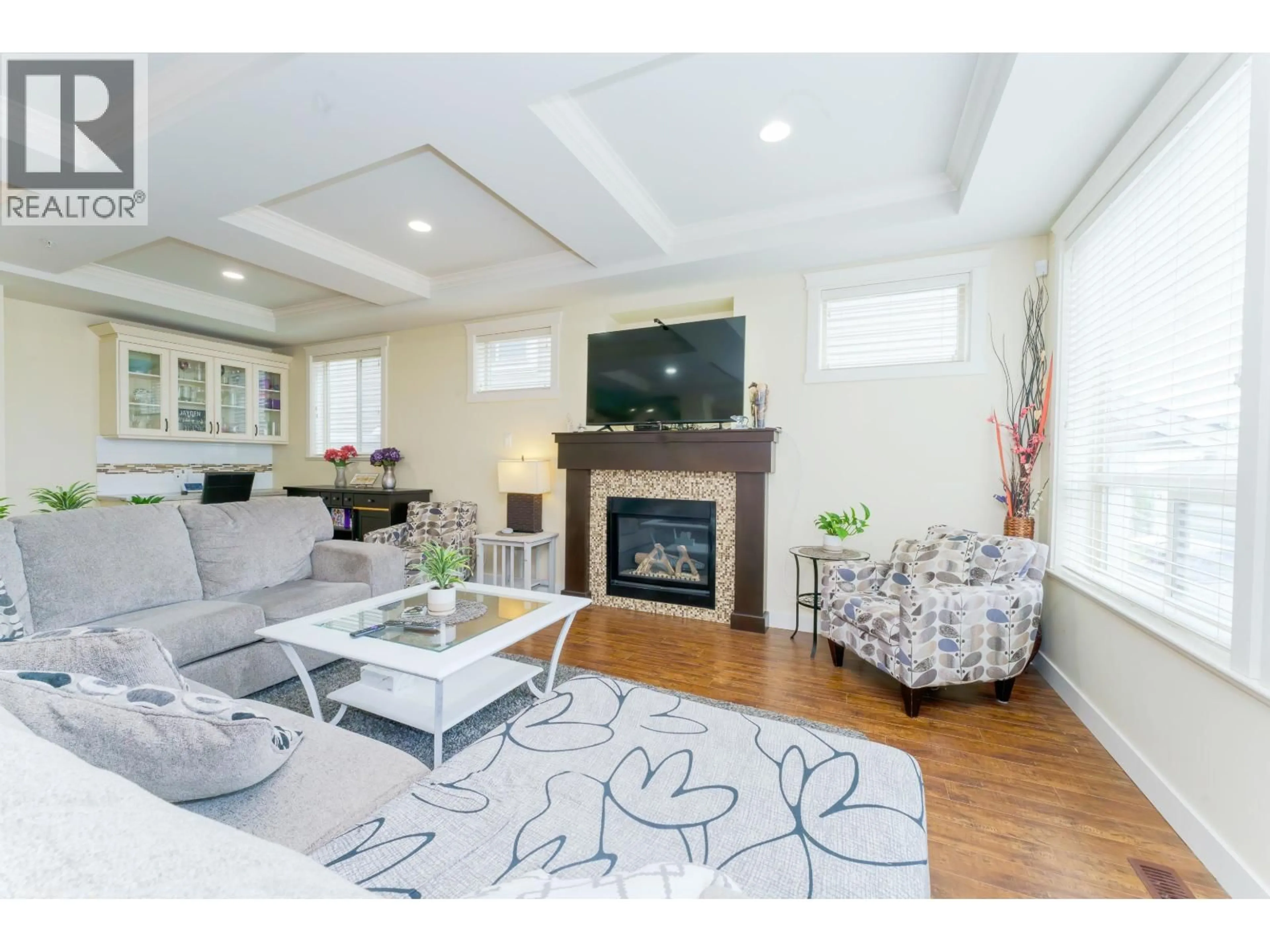 Living room with furniture, wood/laminate floor for 24787 105A AVENUE, Maple Ridge British Columbia V2W0G2
