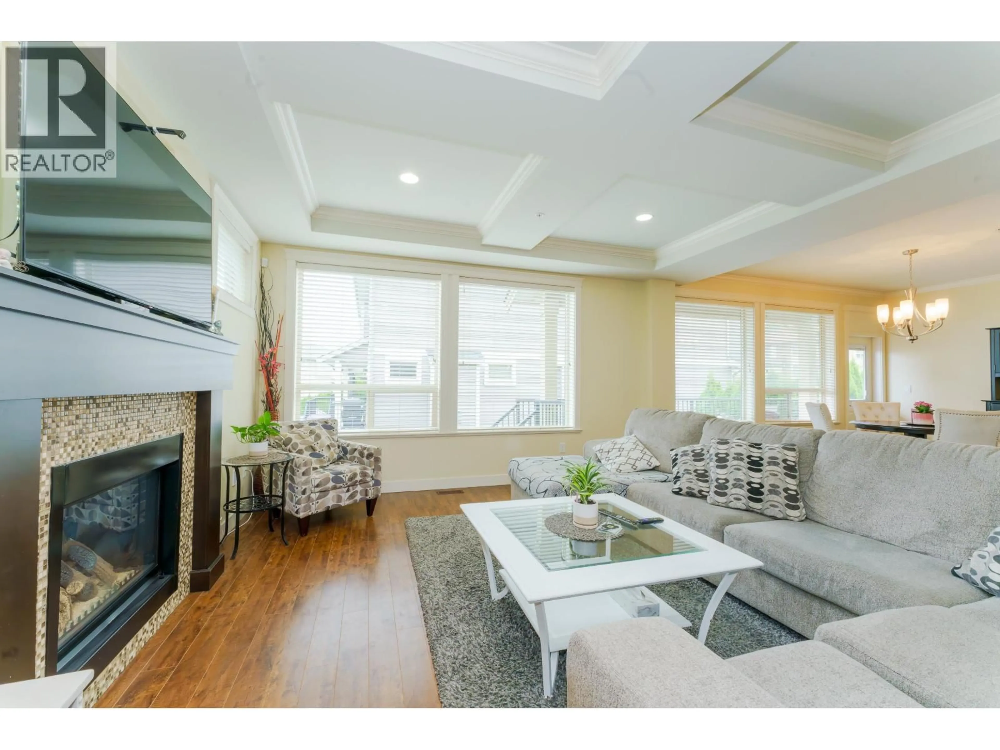Living room with furniture, wood/laminate floor for 24787 105A AVENUE, Maple Ridge British Columbia V2W0G2