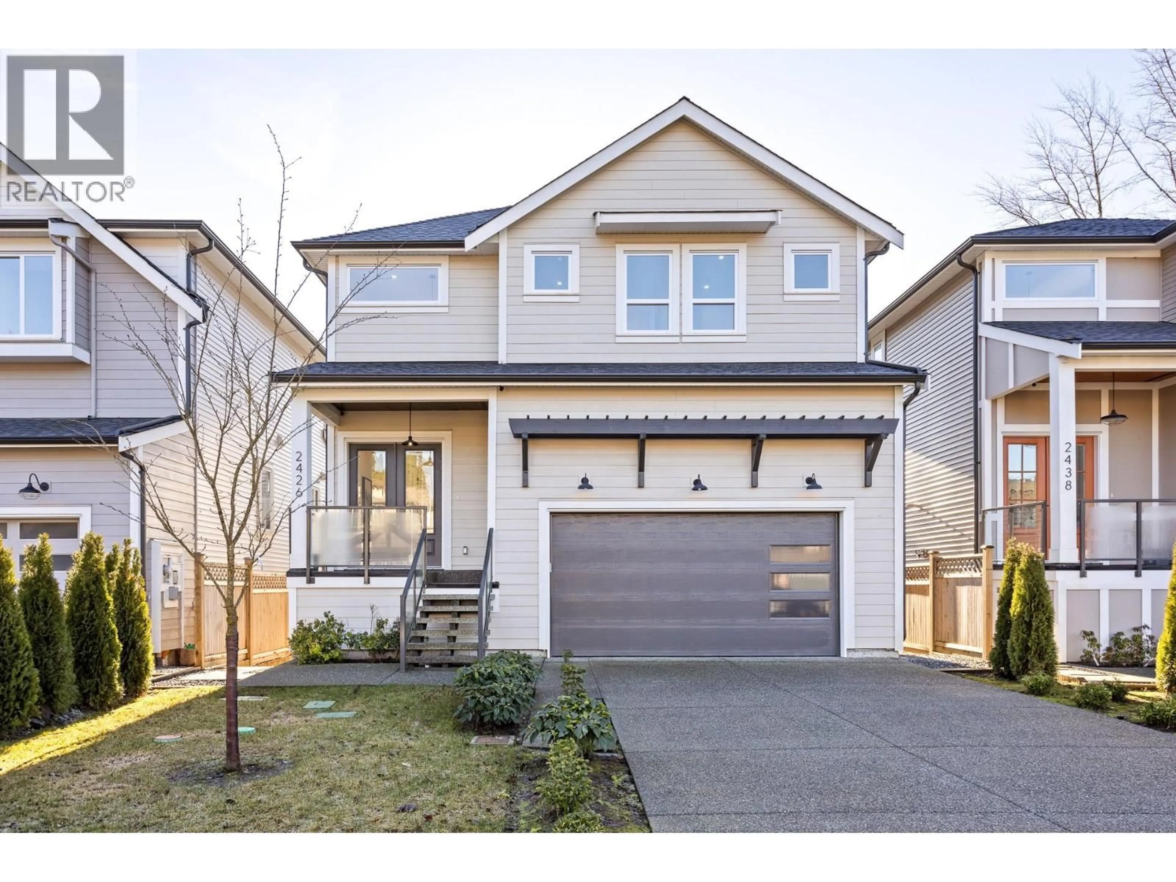 Home with vinyl exterior material, street for 2426 FRISKIE AVENUE, Port Coquitlam British Columbia V3B7P9