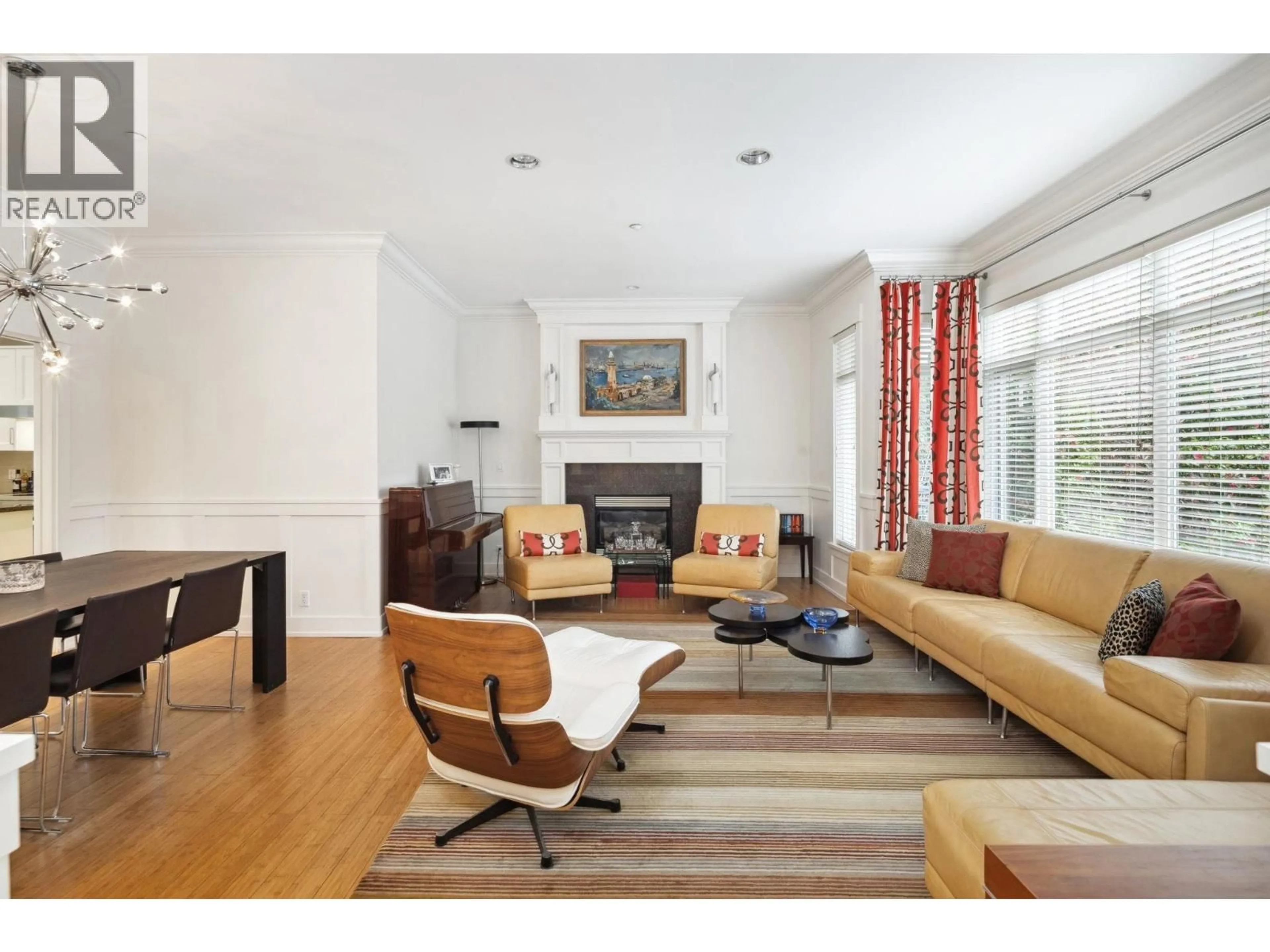 Living room with furniture, wood/laminate floor for 3322 40TH AVENUE, Vancouver British Columbia V6N3B6