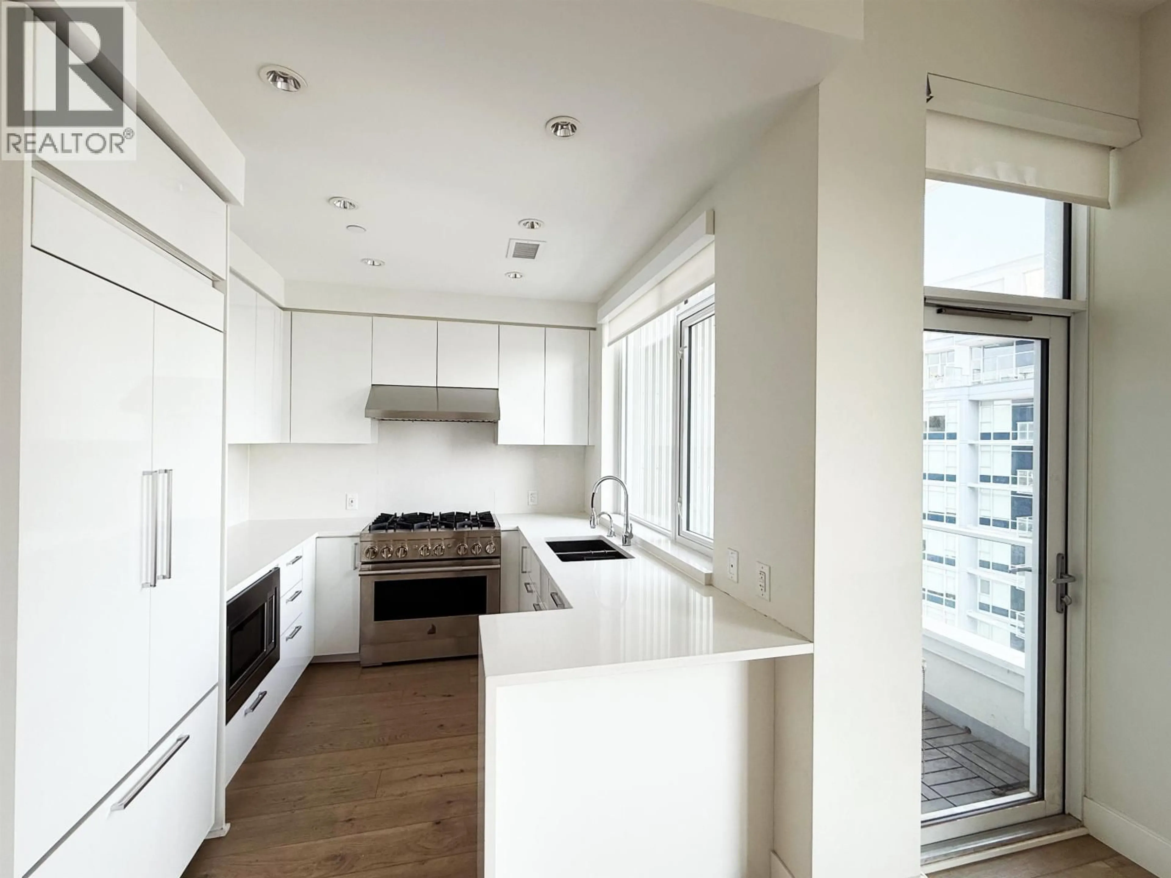 Open concept kitchen, unknown for 1702 - 8533 RIVER DISTRICT CROSSING, Vancouver British Columbia V5S0H2