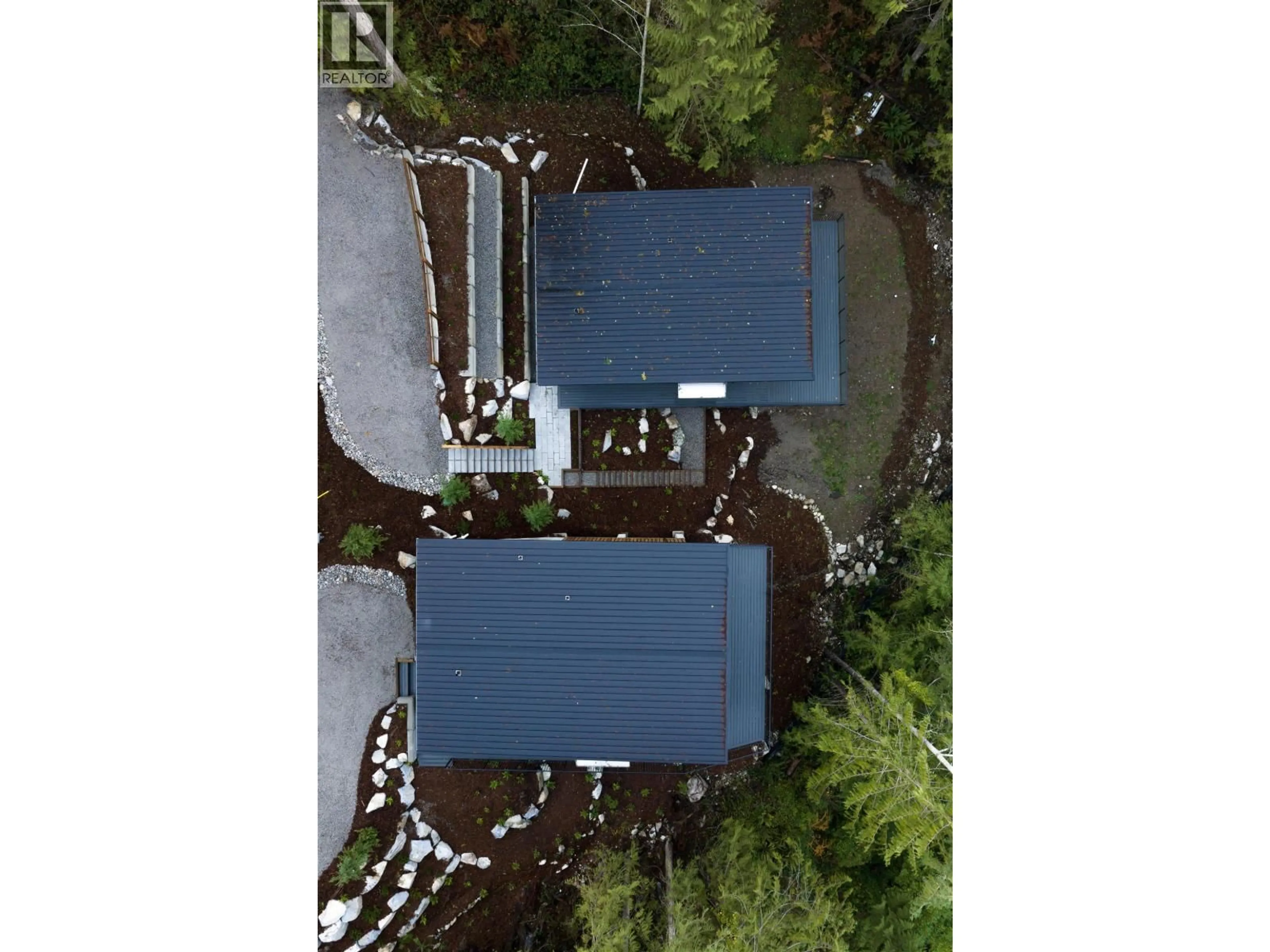 A pic from outside/outdoor area/front of a property/back of a property/a pic from drone, unknown for 5792 TILLICUM BAY ROAD, Sechelt British Columbia V7Z0C7