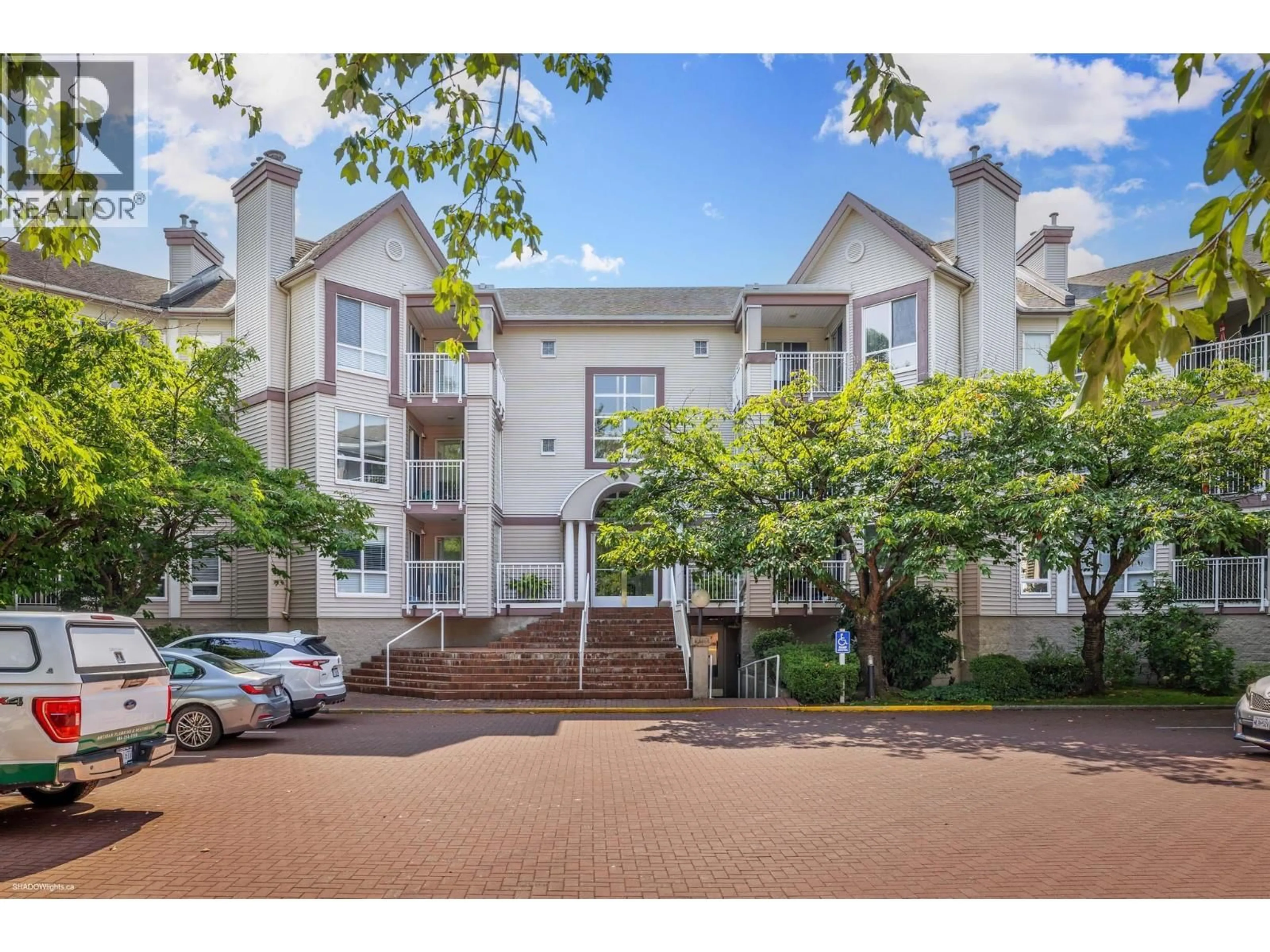 A pic from outside/outdoor area/front of a property/back of a property/a pic from drone, street for 213 - 7453 MOFFATT ROAD, Richmond British Columbia V6Y3W1