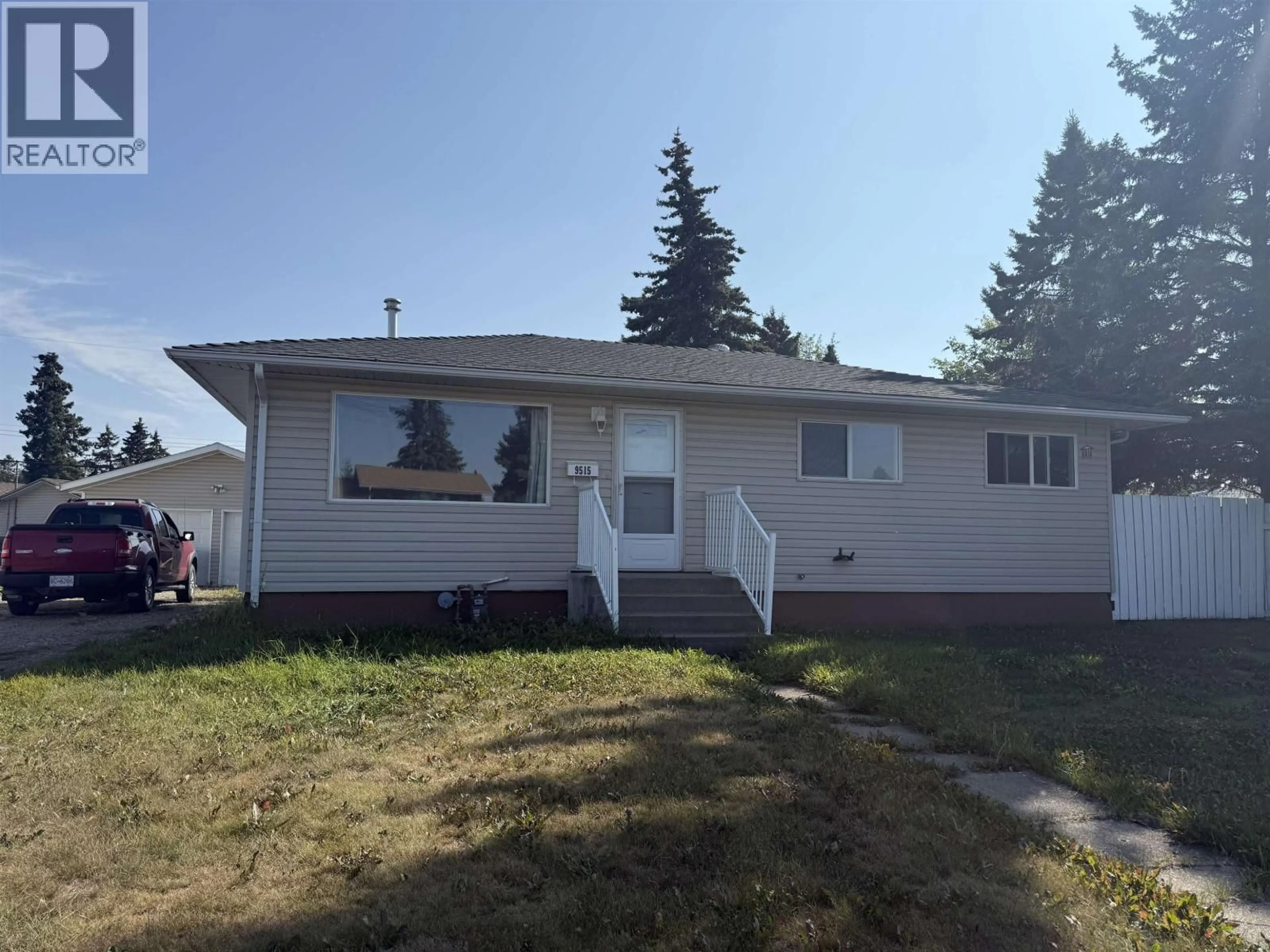 Home with vinyl exterior material, street for 9515 PEACE RIVER ROAD, Fort St. John British Columbia V1J2S3