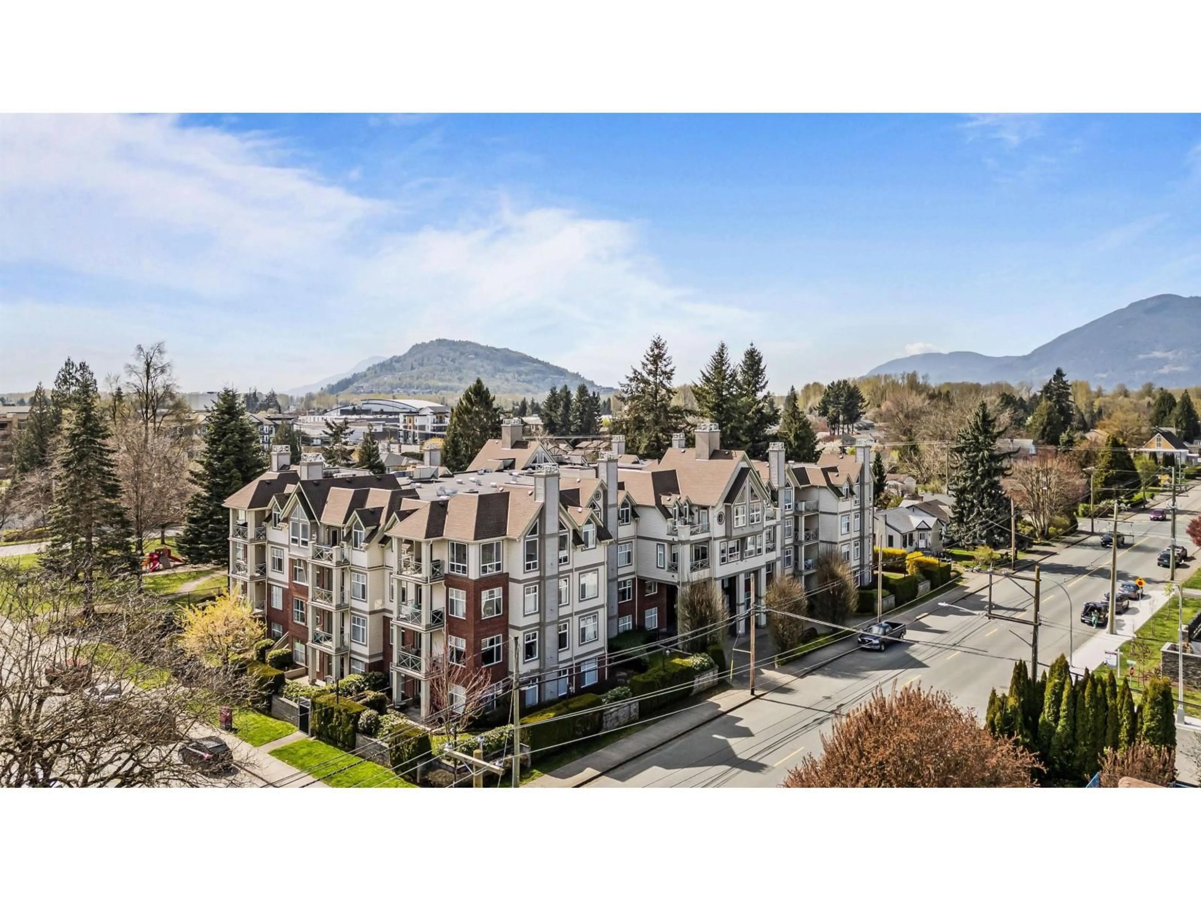 A pic from outside/outdoor area/front of a property/back of a property/a pic from drone, mountain view for 406 - 45700 WELLINGTON AVENUE, Chilliwack British Columbia V2P2E4