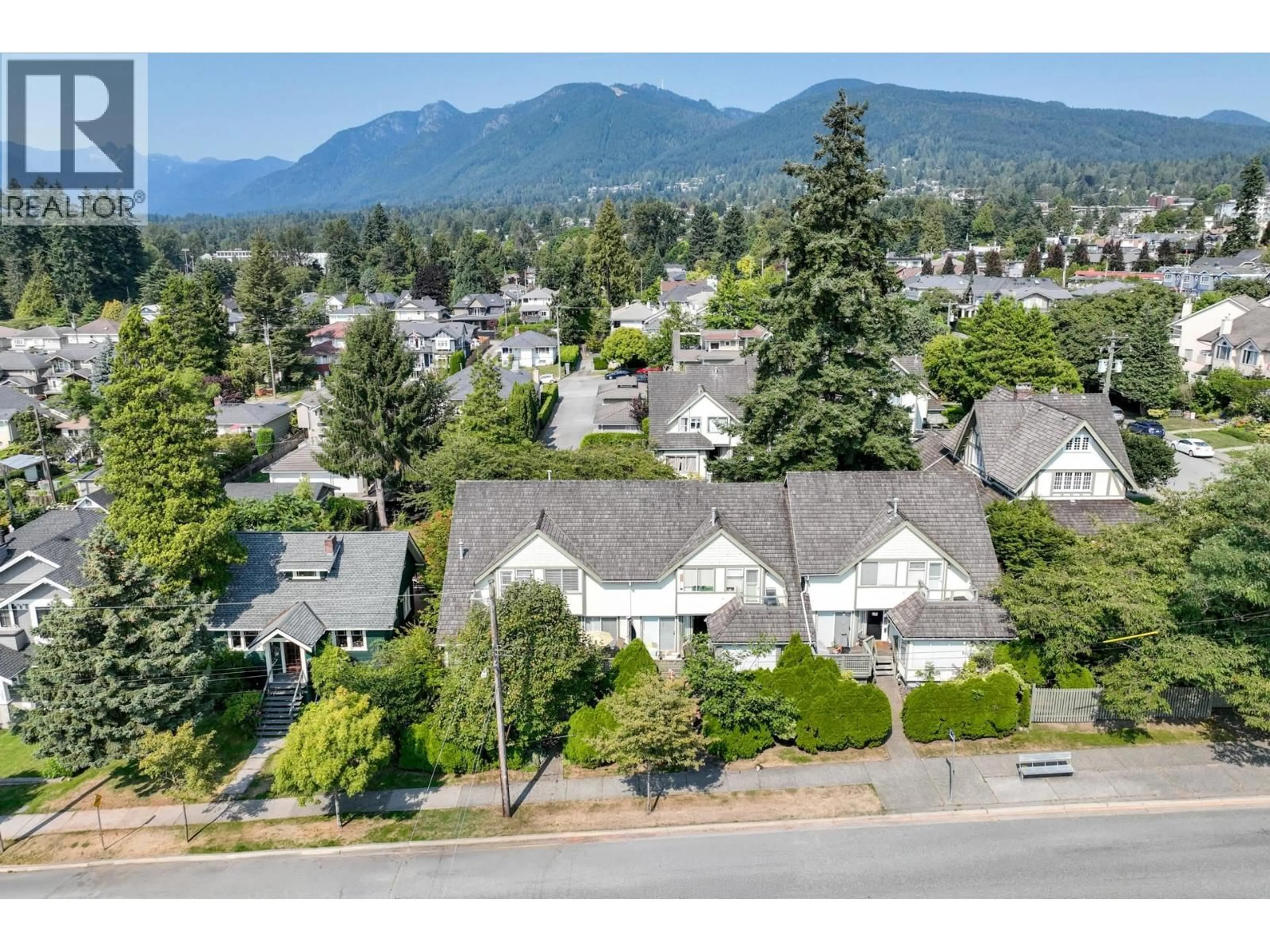 A pic from outside/outdoor area/front of a property/back of a property/a pic from drone, mountain view for 308 15TH STREET, North Vancouver British Columbia V7M1S5