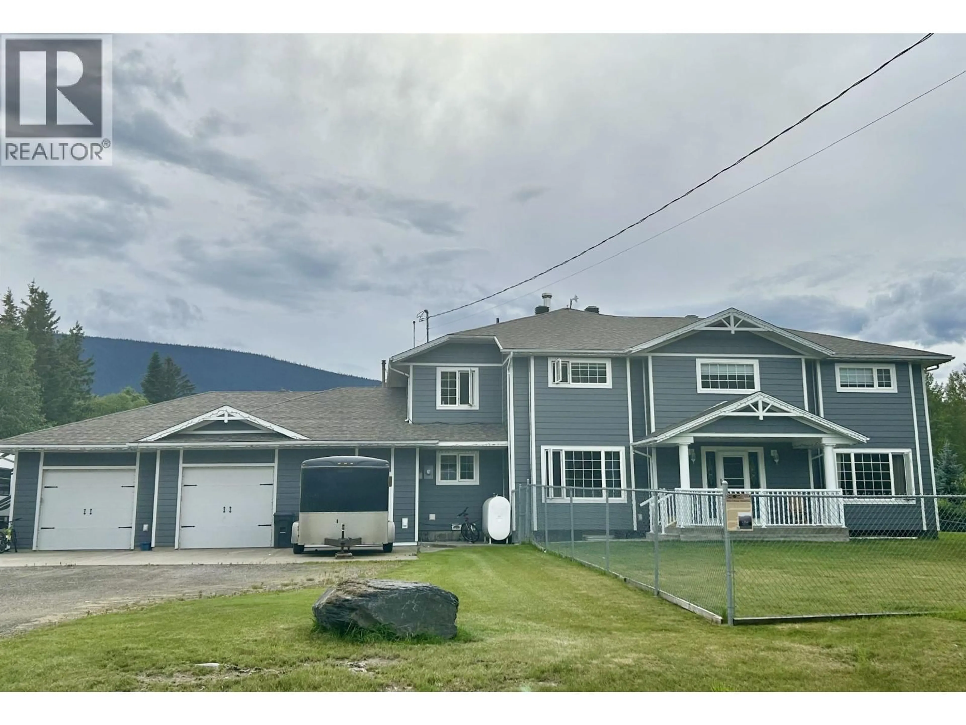 A pic from outside/outdoor area/front of a property/back of a property/a pic from drone, mountain view for 1269 2ND AVENUE, McBride British Columbia V0J2E0