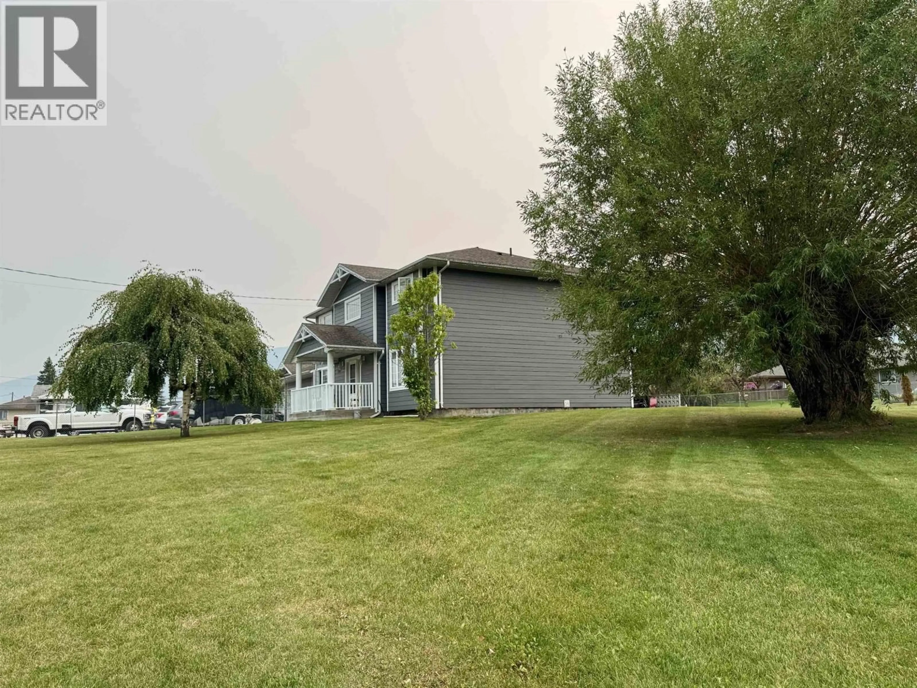 A pic from outside/outdoor area/front of a property/back of a property/a pic from drone, water/lake/river/ocean view for 1269 2ND AVENUE, McBride British Columbia V0J2E0