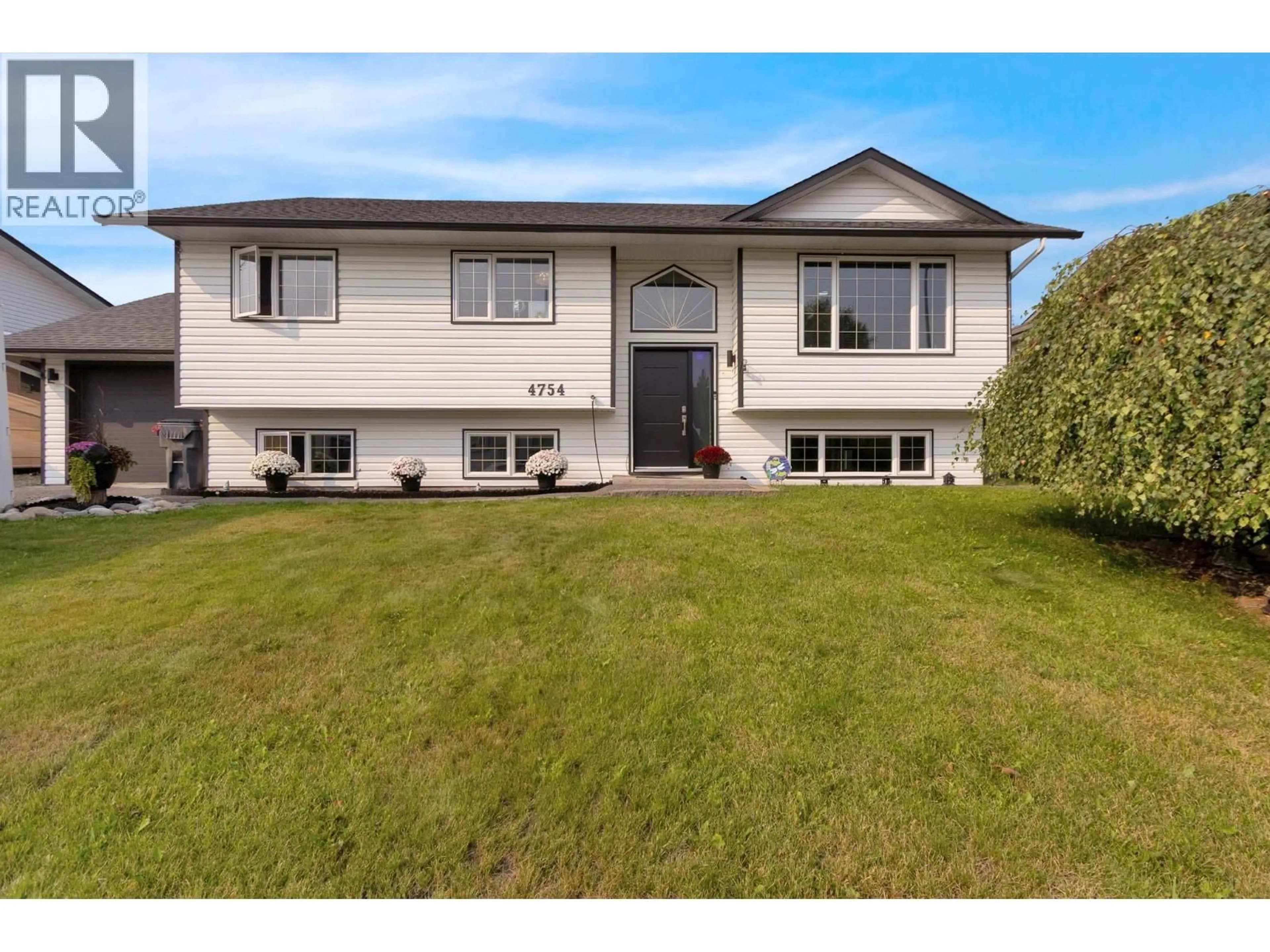 Home with vinyl exterior material, street for 4754 VELLENCHER ROAD, Prince George British Columbia V2K4P1