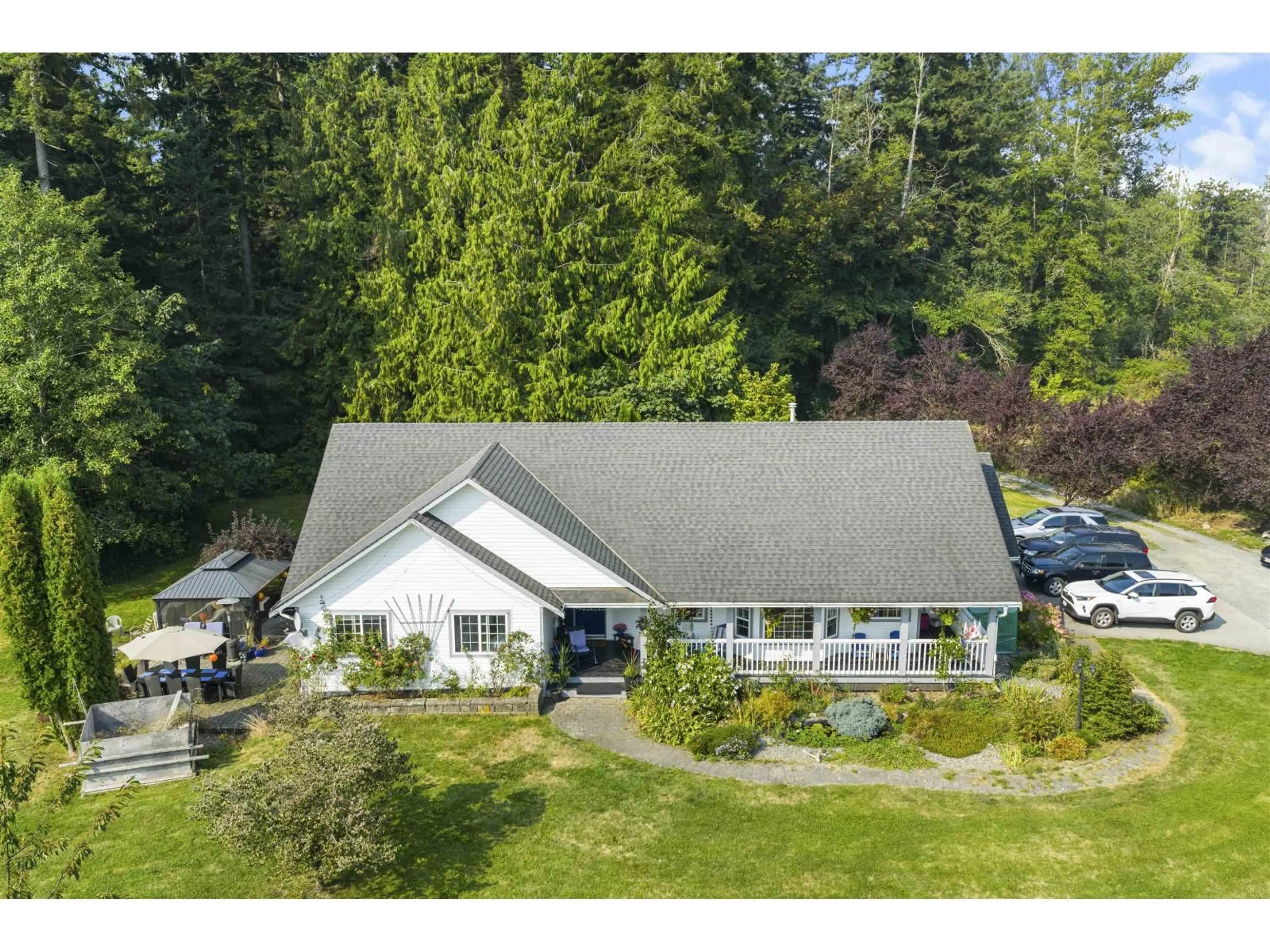 A pic from outside/outdoor area/front of a property/back of a property/a pic from drone, mountain view for 2567 232, Langley British Columbia V2Z3B5