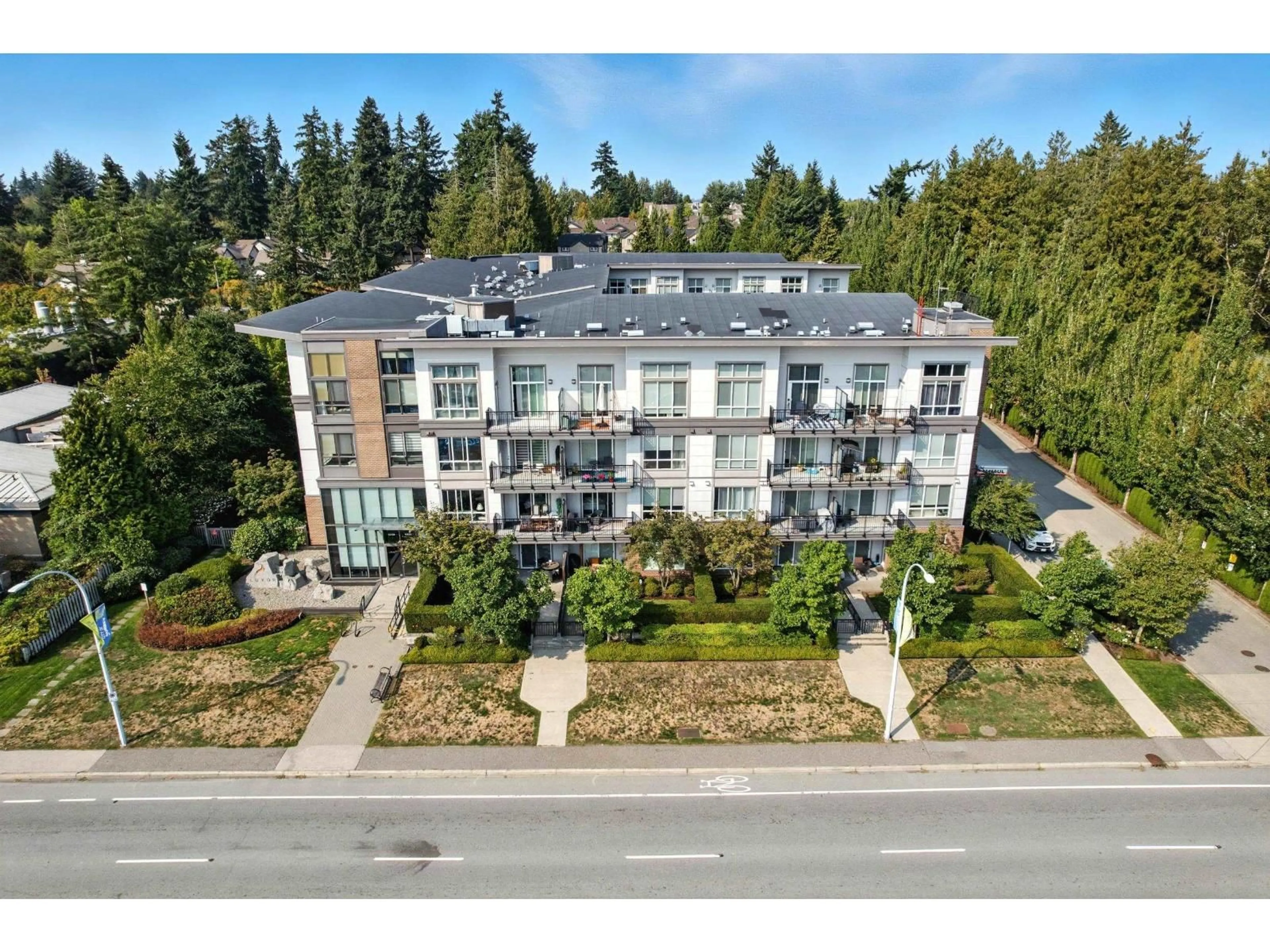 A pic from outside/outdoor area/front of a property/back of a property/a pic from drone, building for 423 - 12039 64TH, Surrey British Columbia V3W0R7