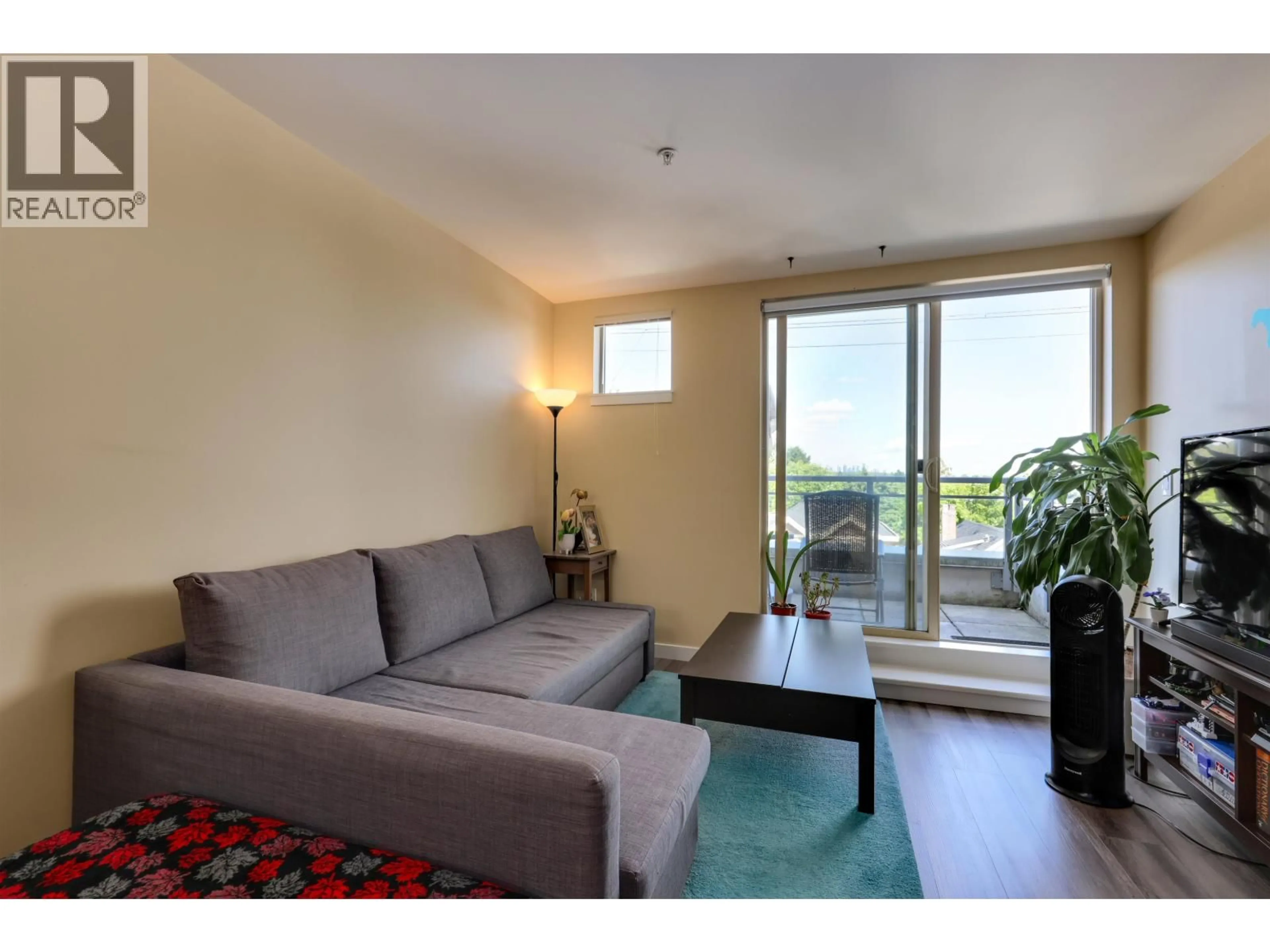 Living room with furniture, unknown for PH3 - 6172 FRASER STREET, Vancouver British Columbia V5W3A1