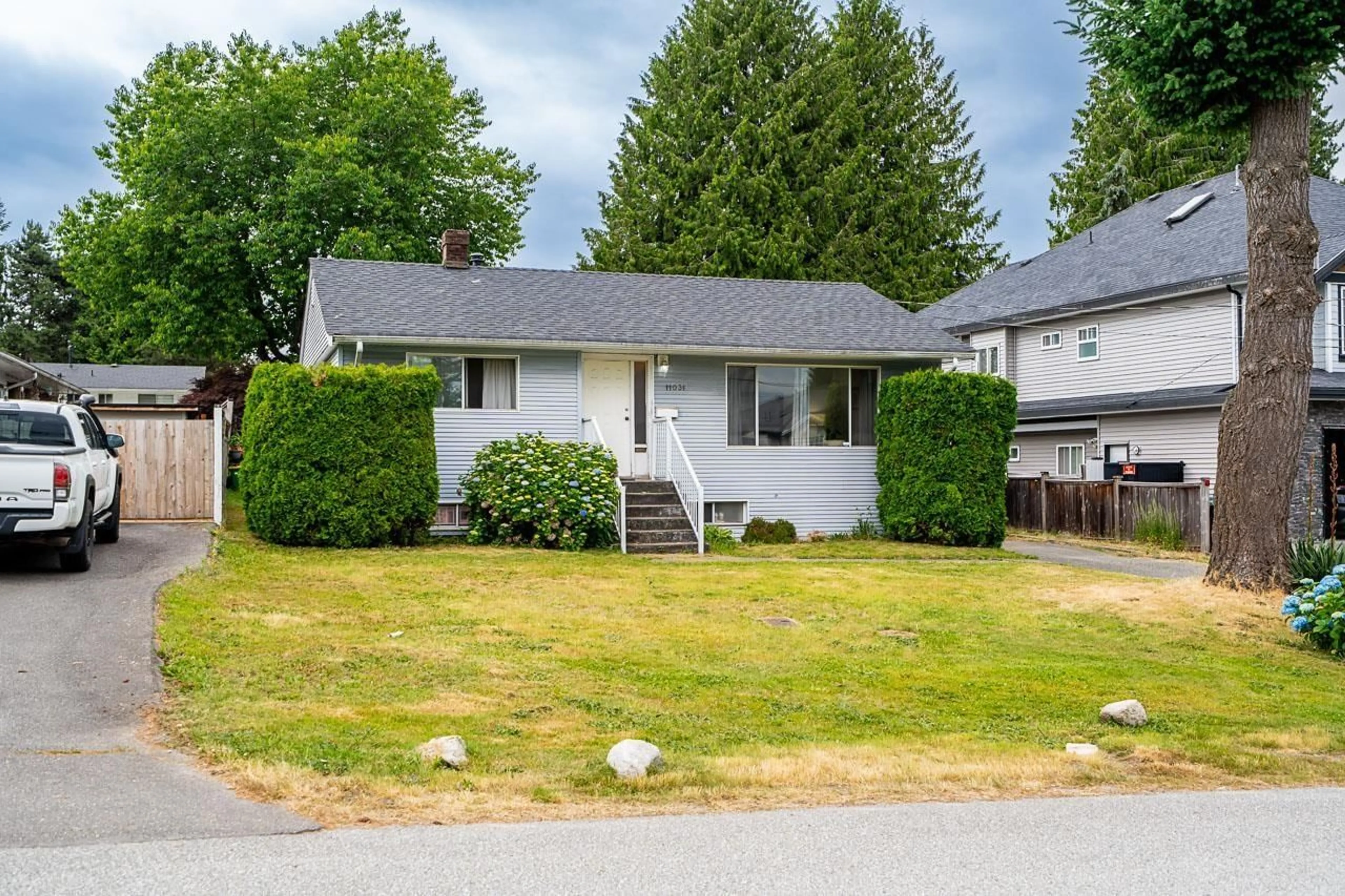 Home with vinyl exterior material, street for 11031 131A, Surrey British Columbia V3S3S1