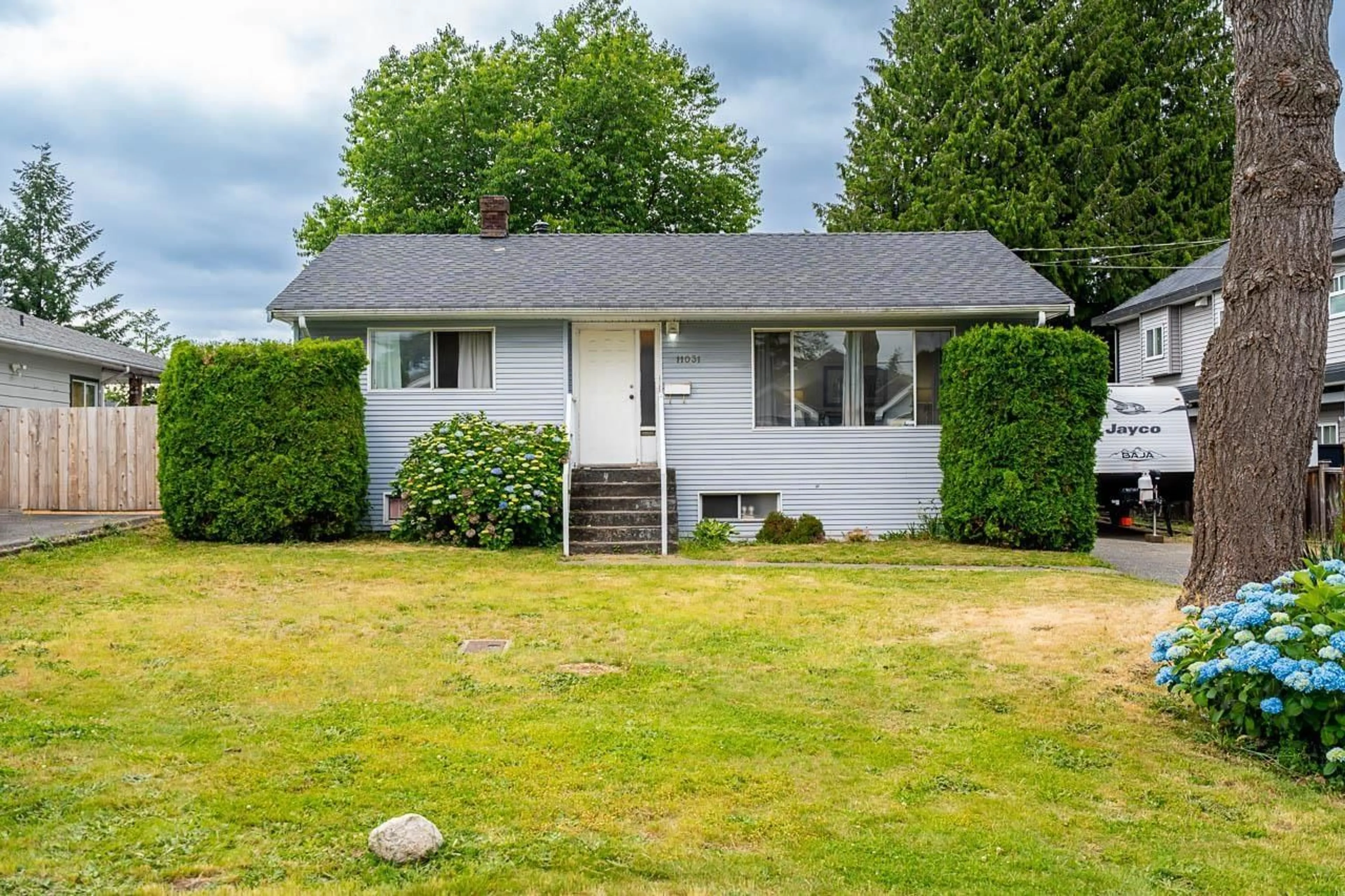 Home with vinyl exterior material, street for 11031 131A, Surrey British Columbia V3S3S1