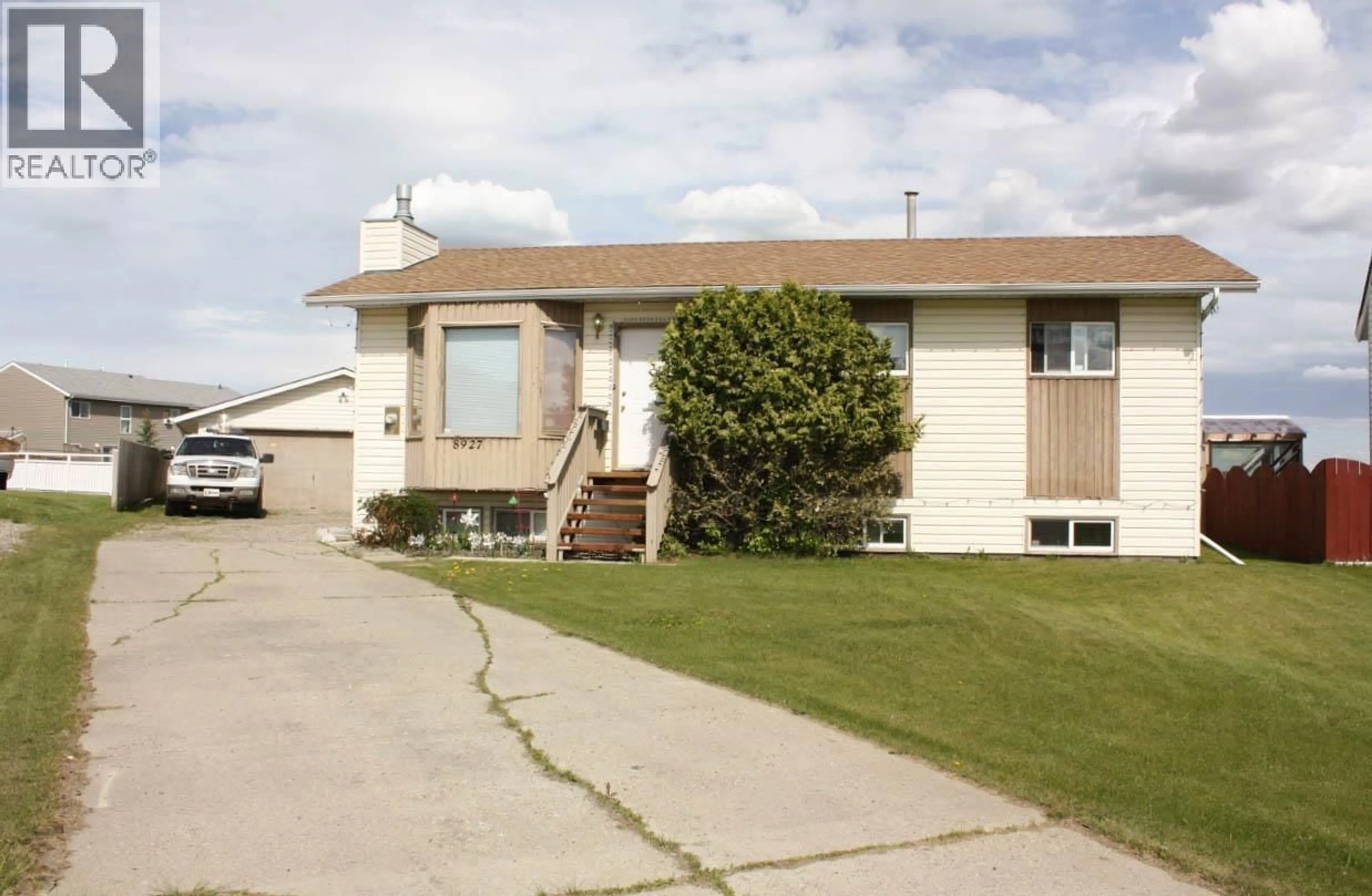 Home with vinyl exterior material, street for 8927 83A STREET, Fort St. John British Columbia V1J6M1