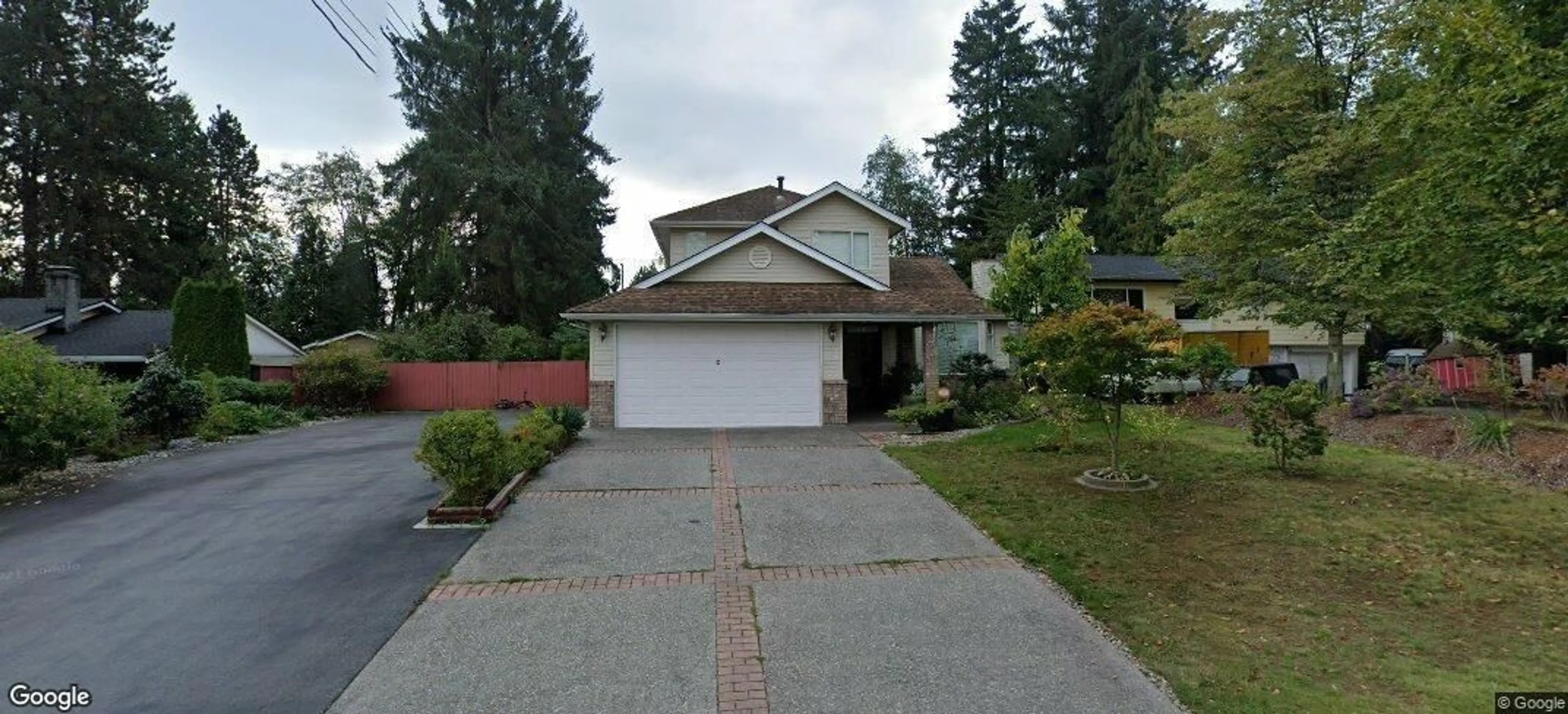 Home with vinyl exterior material, street for 14710 106, Surrey British Columbia V3R5Y1