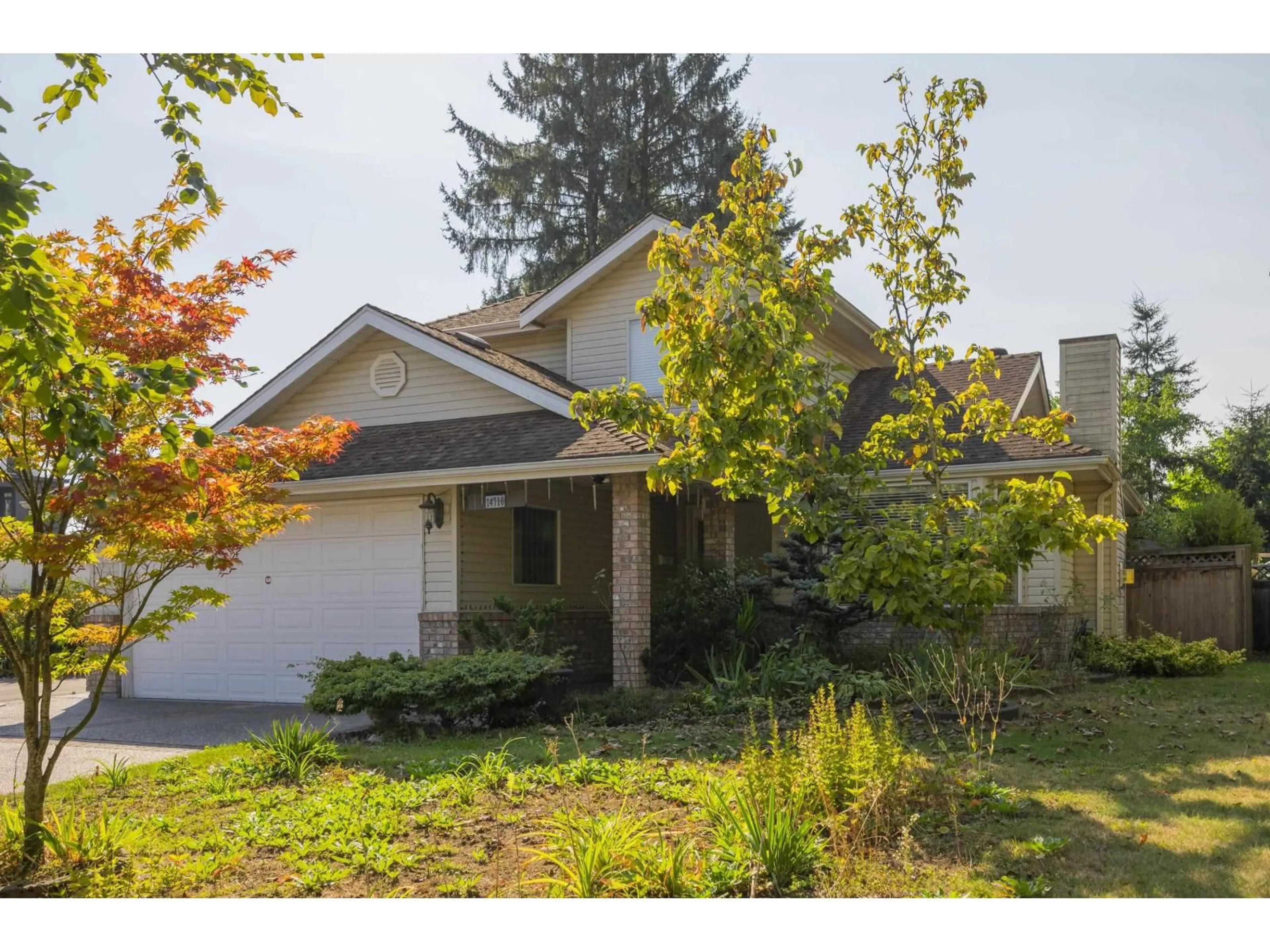 Home with vinyl exterior material, street for 14710 106, Surrey British Columbia V3R5Y1