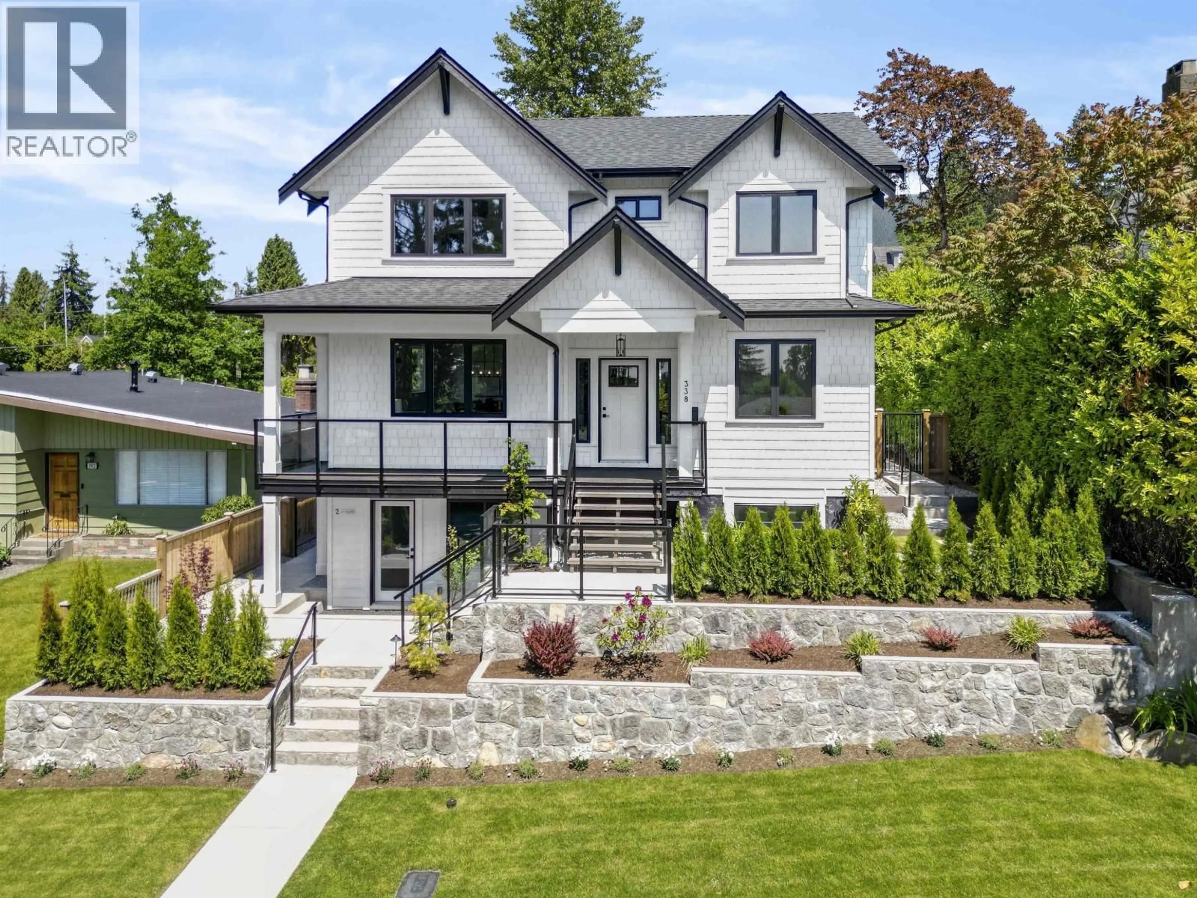 Home with brick exterior material, street for 338 24TH STREET, North Vancouver British Columbia V7M2C6