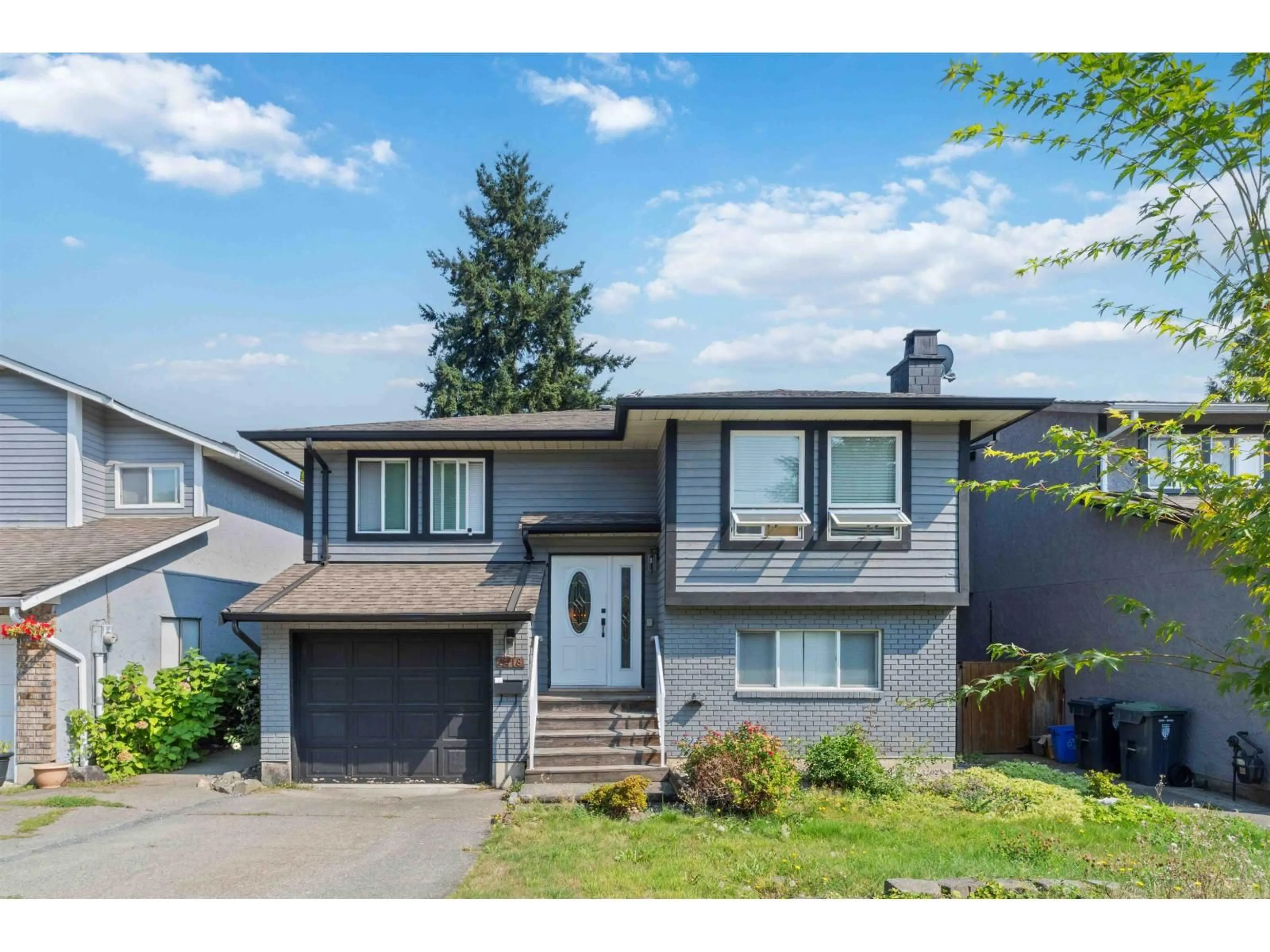 Home with vinyl exterior material, street for 2418 WAYBURNE, Langley British Columbia V2Y1B7
