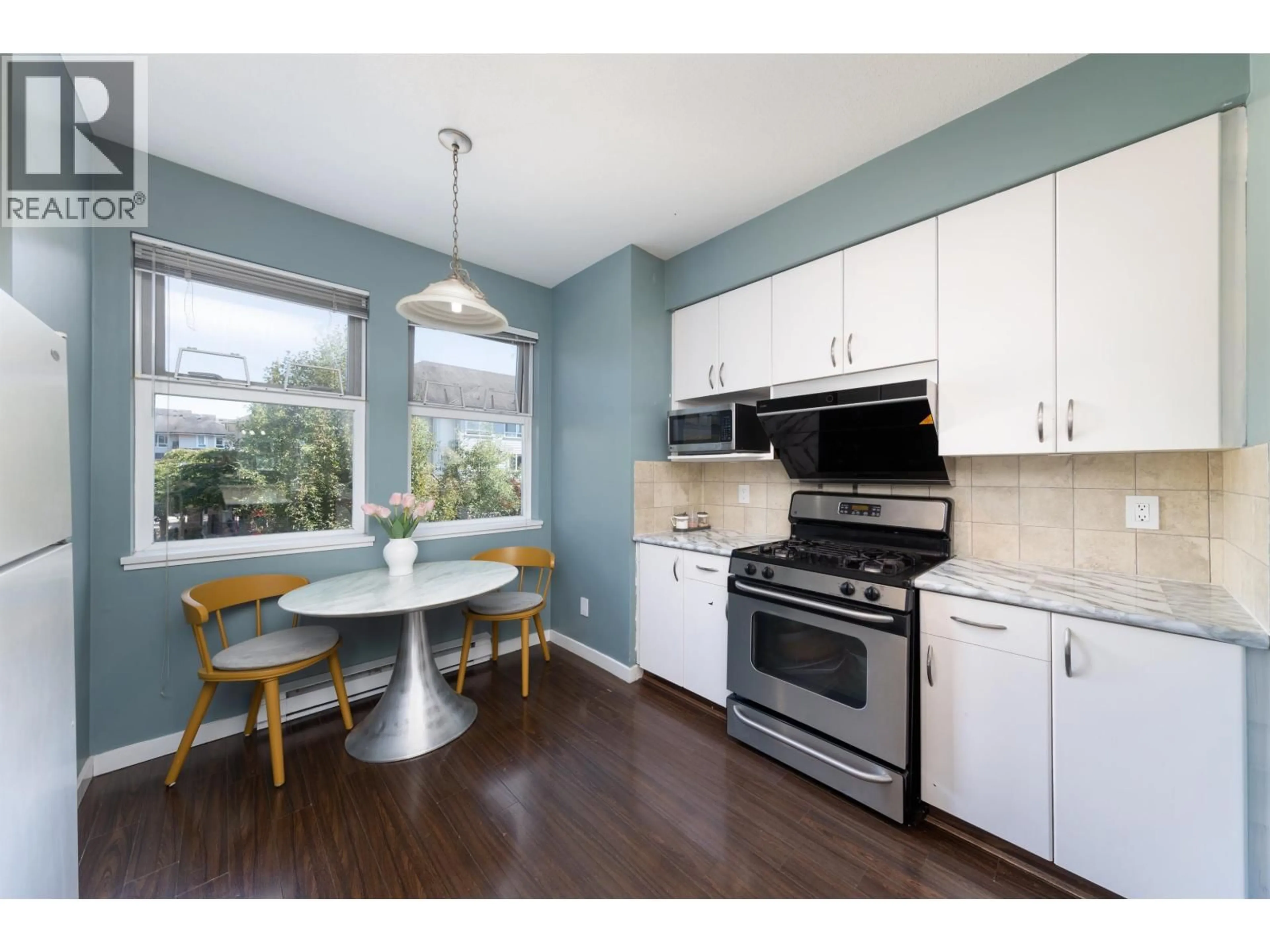 Open concept kitchen, wood/laminate floor for 45 - 6099 ALDER STREET, Richmond British Columbia V6Y0A8