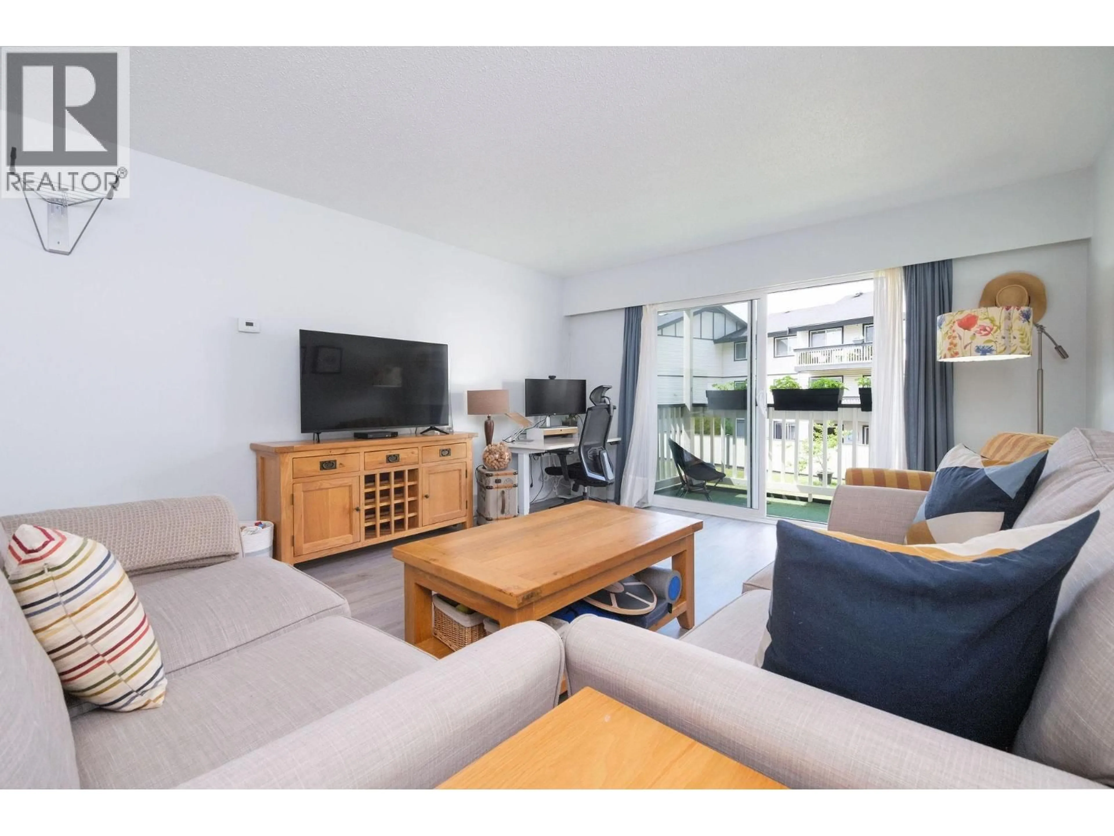 Living room with furniture, unknown for 216 - 780 PREMIER STREET, North Vancouver British Columbia V7J2G8