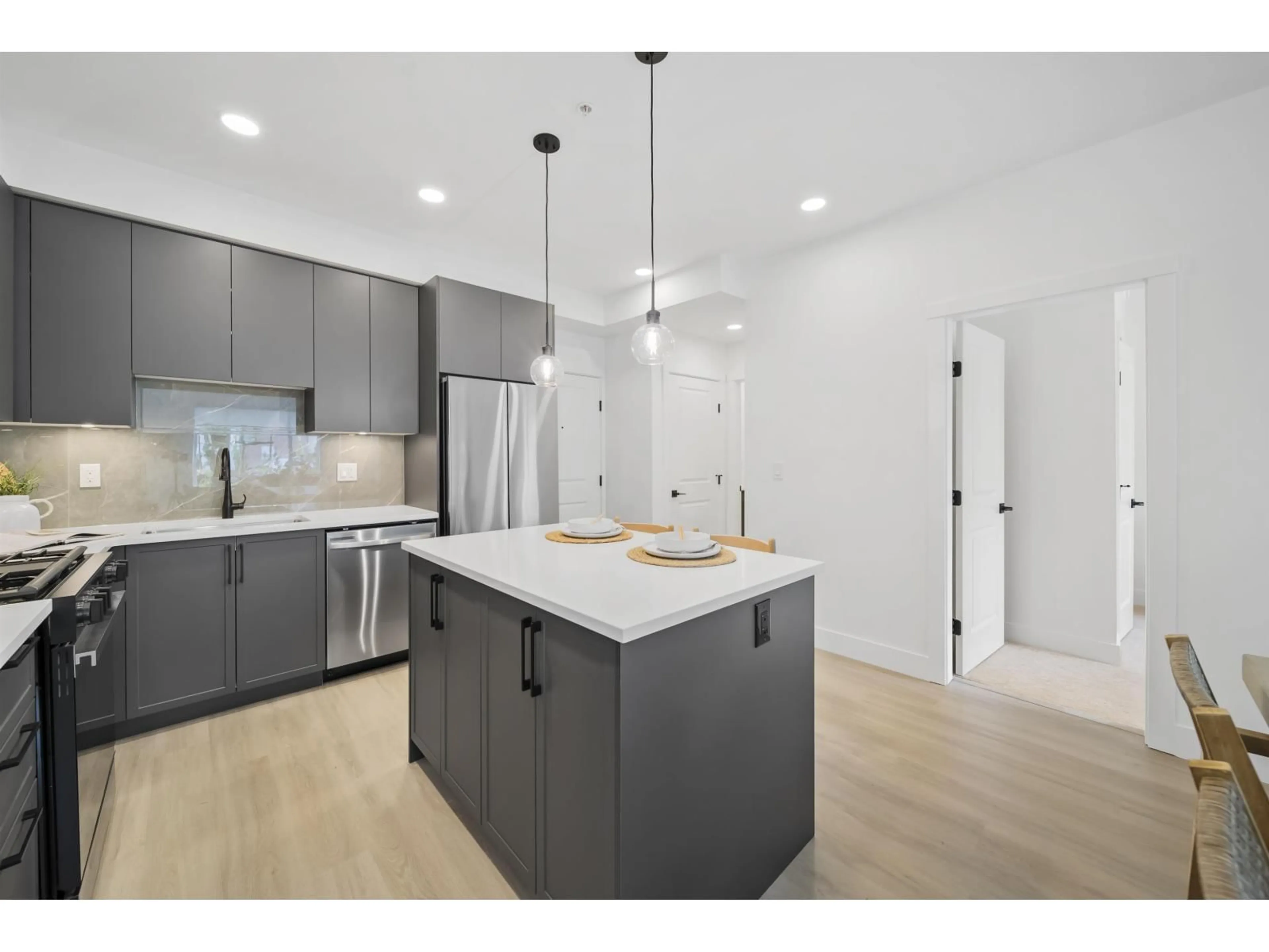 Open concept kitchen, unknown for 317 - 3438 146A, Surrey British Columbia V0V0V0