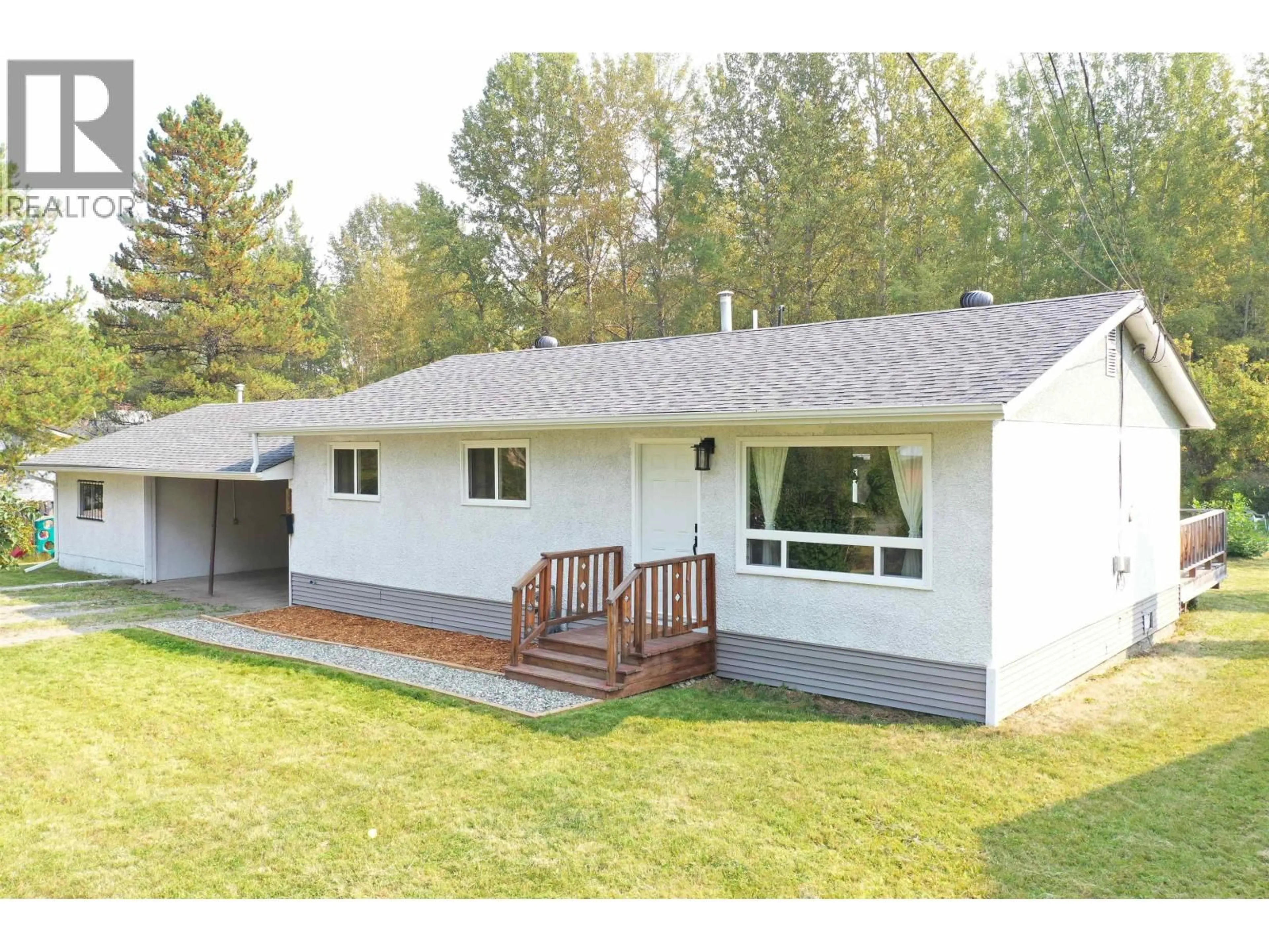 Home with vinyl exterior material, street for 1292 HAUSAMAN ROAD, Quesnel British Columbia V2J3V1