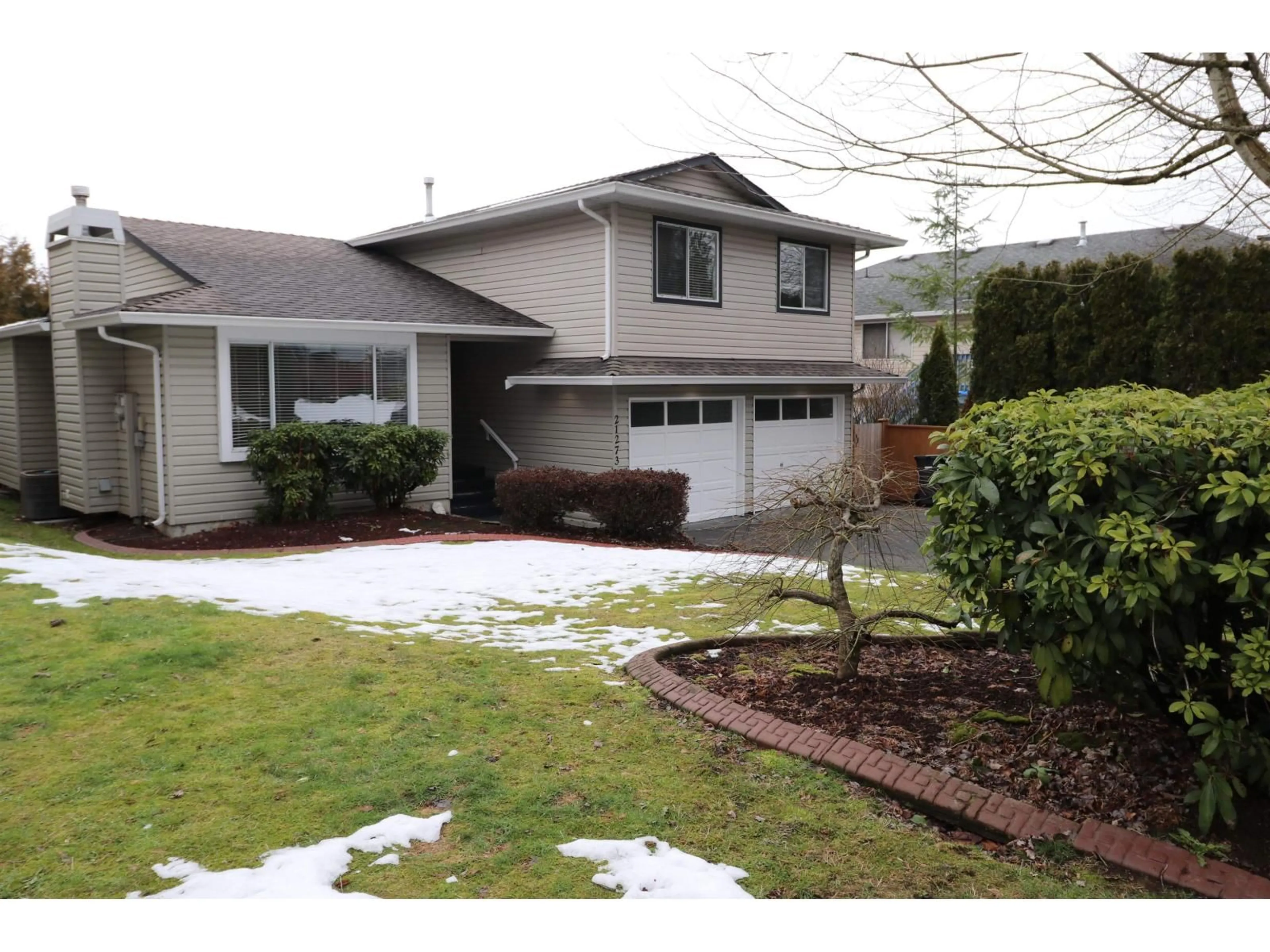 Home with vinyl exterior material, street for 21273 89, Langley British Columbia V1M2E2