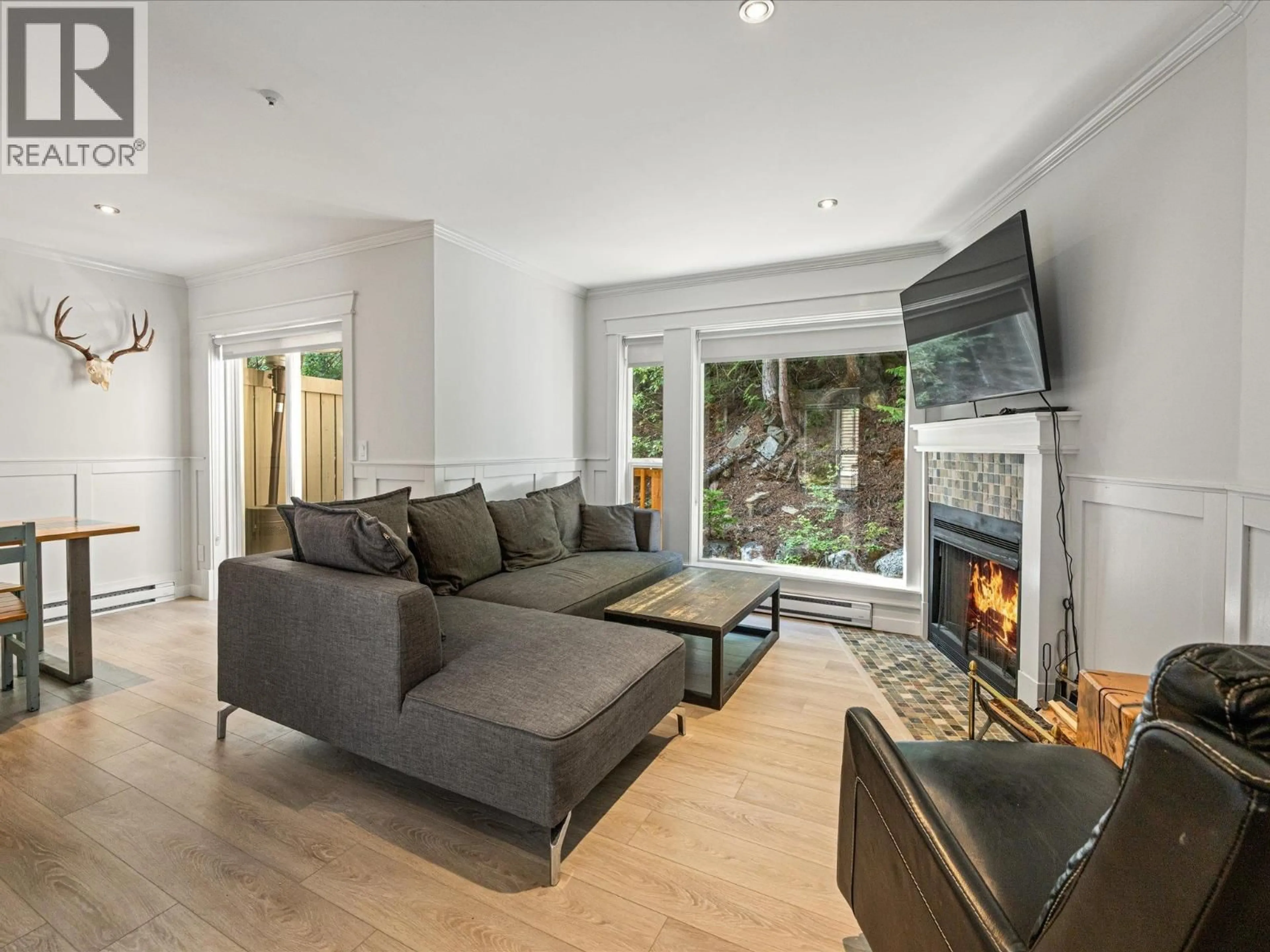 Living room with furniture, wood/laminate floor for 32 - 1400 PARK STREET, Pemberton British Columbia V0N2L1