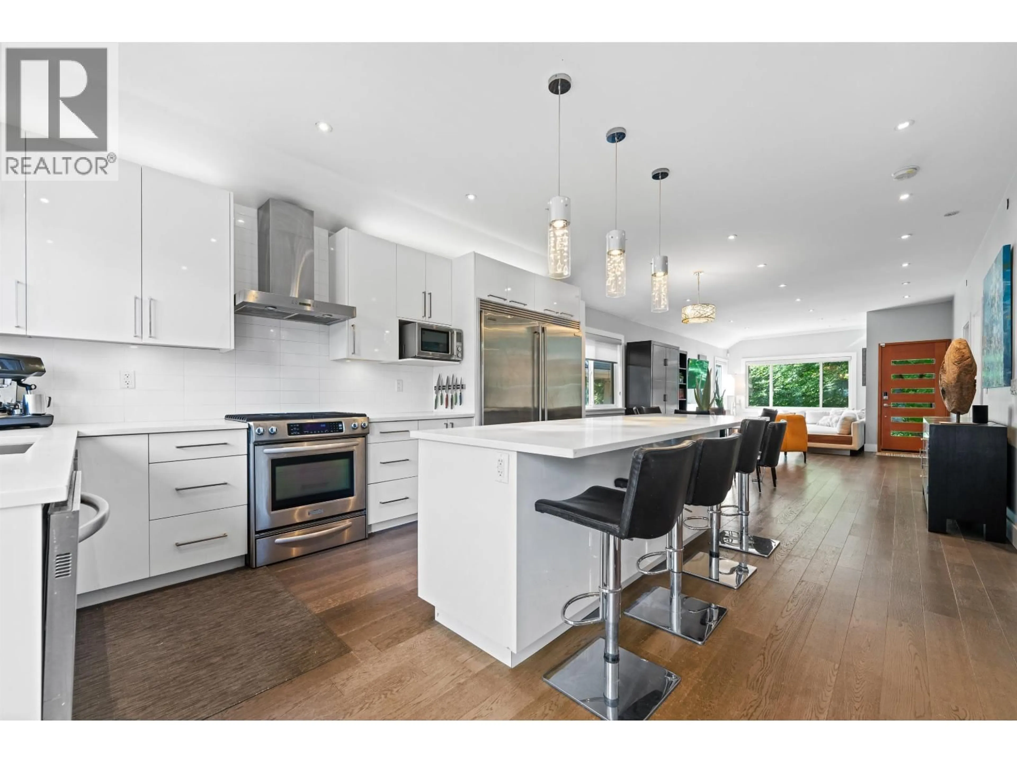 Open concept kitchen, wood/laminate floor for 1630 13TH AVENUE, Vancouver British Columbia V5N2B8