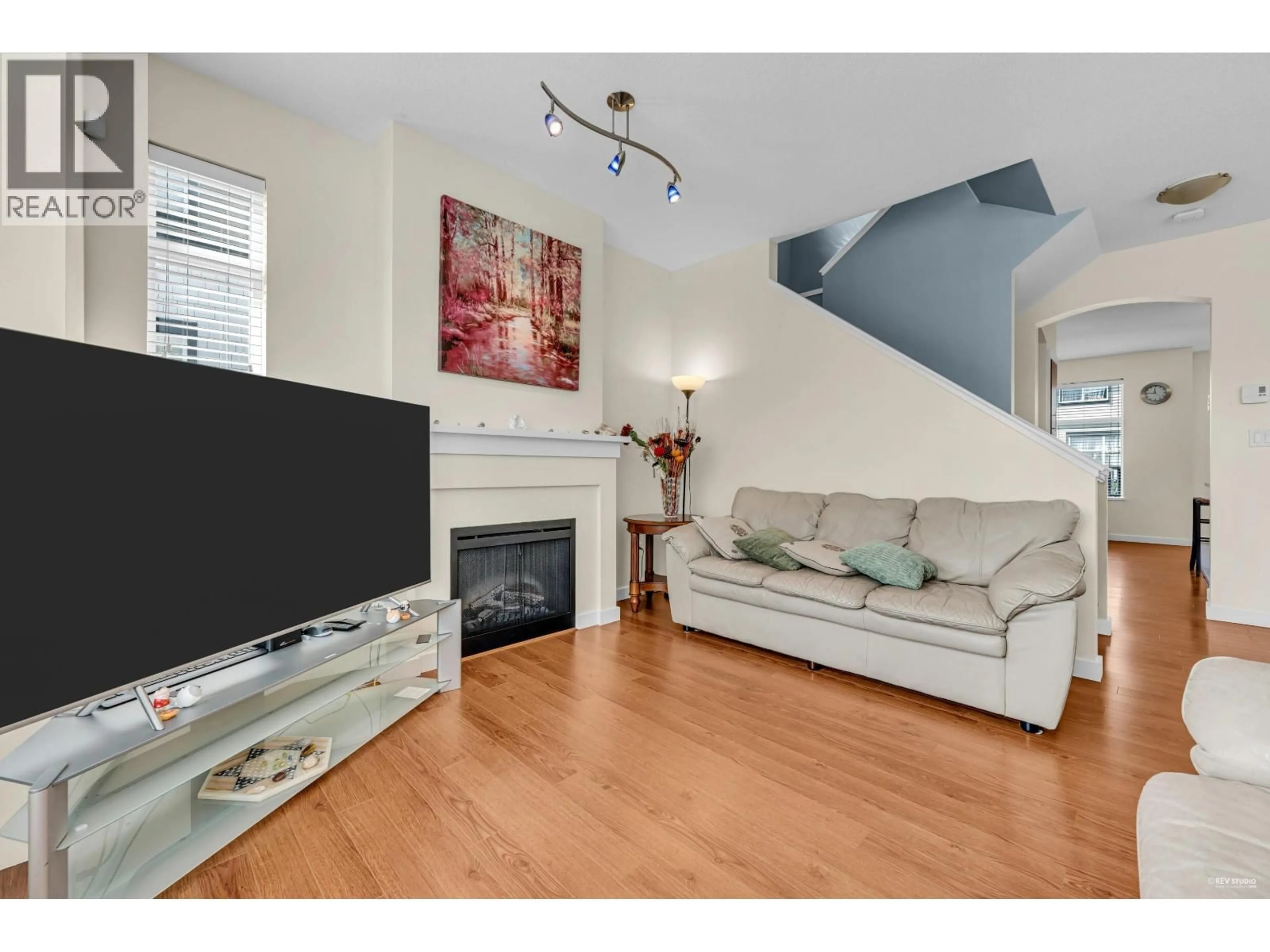 Living room with furniture, wood/laminate floor for 29 - 9833 KEEFER AVENUE, Richmond British Columbia V6Y4M5