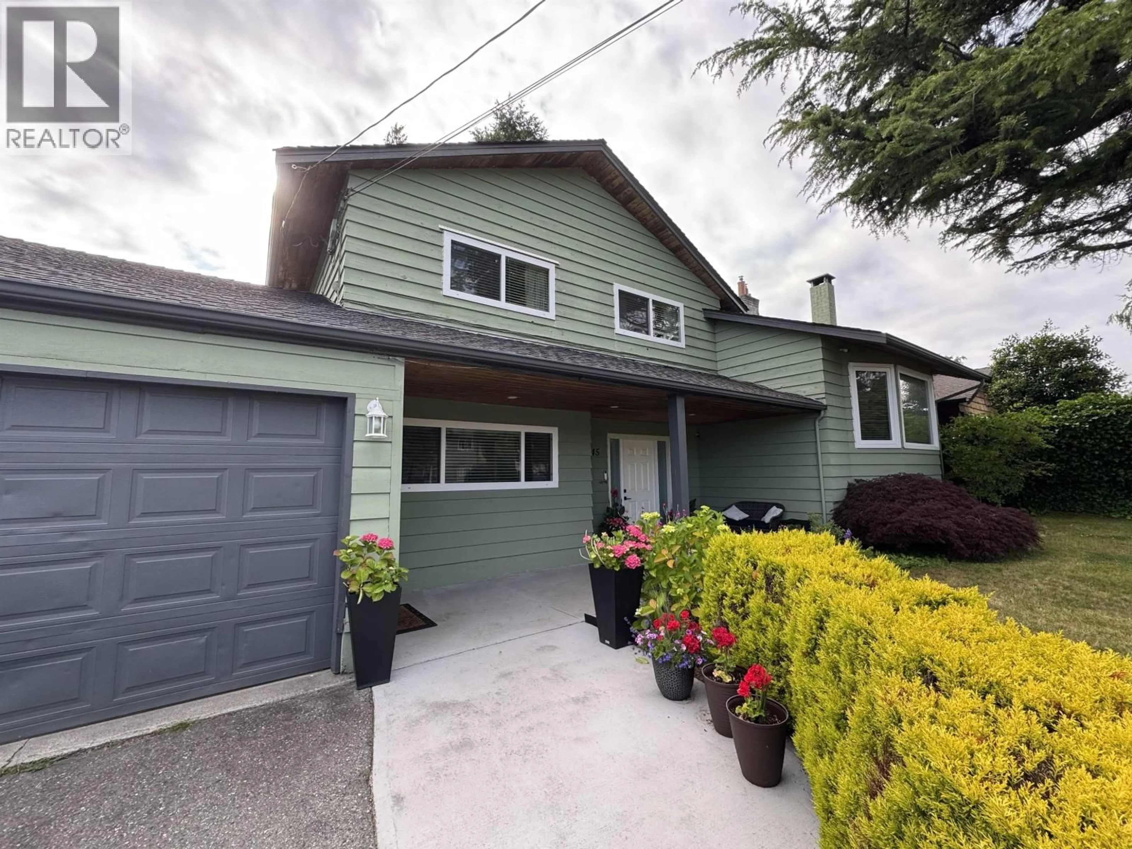 Home with vinyl exterior material, street for 1345 53A STREET, Delta British Columbia V4M3E8