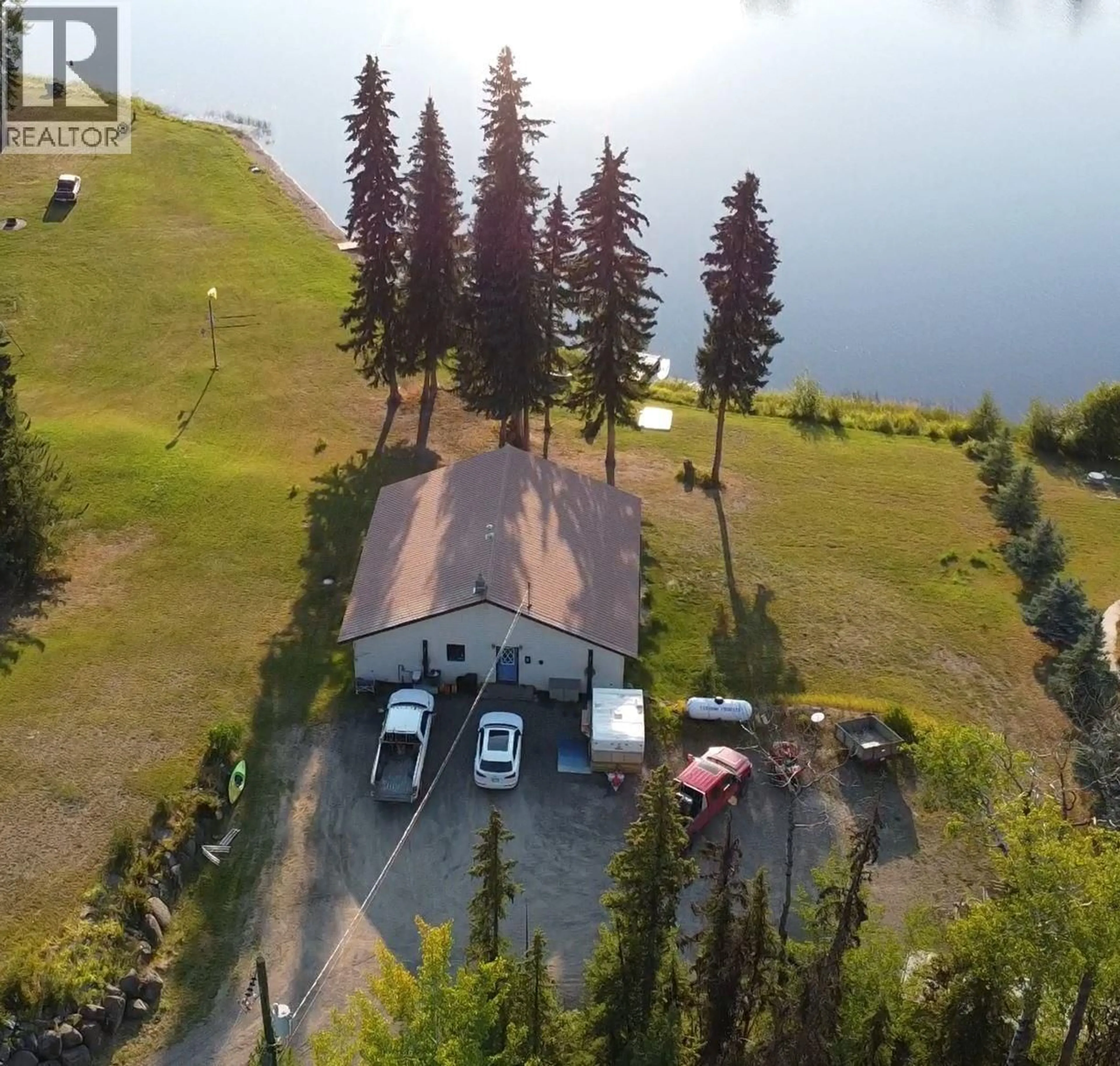 A pic from outside/outdoor area/front of a property/back of a property/a pic from drone, water/lake/river/ocean view for 624 TIBBLES ROAD, Quesnel British Columbia V2J3H9