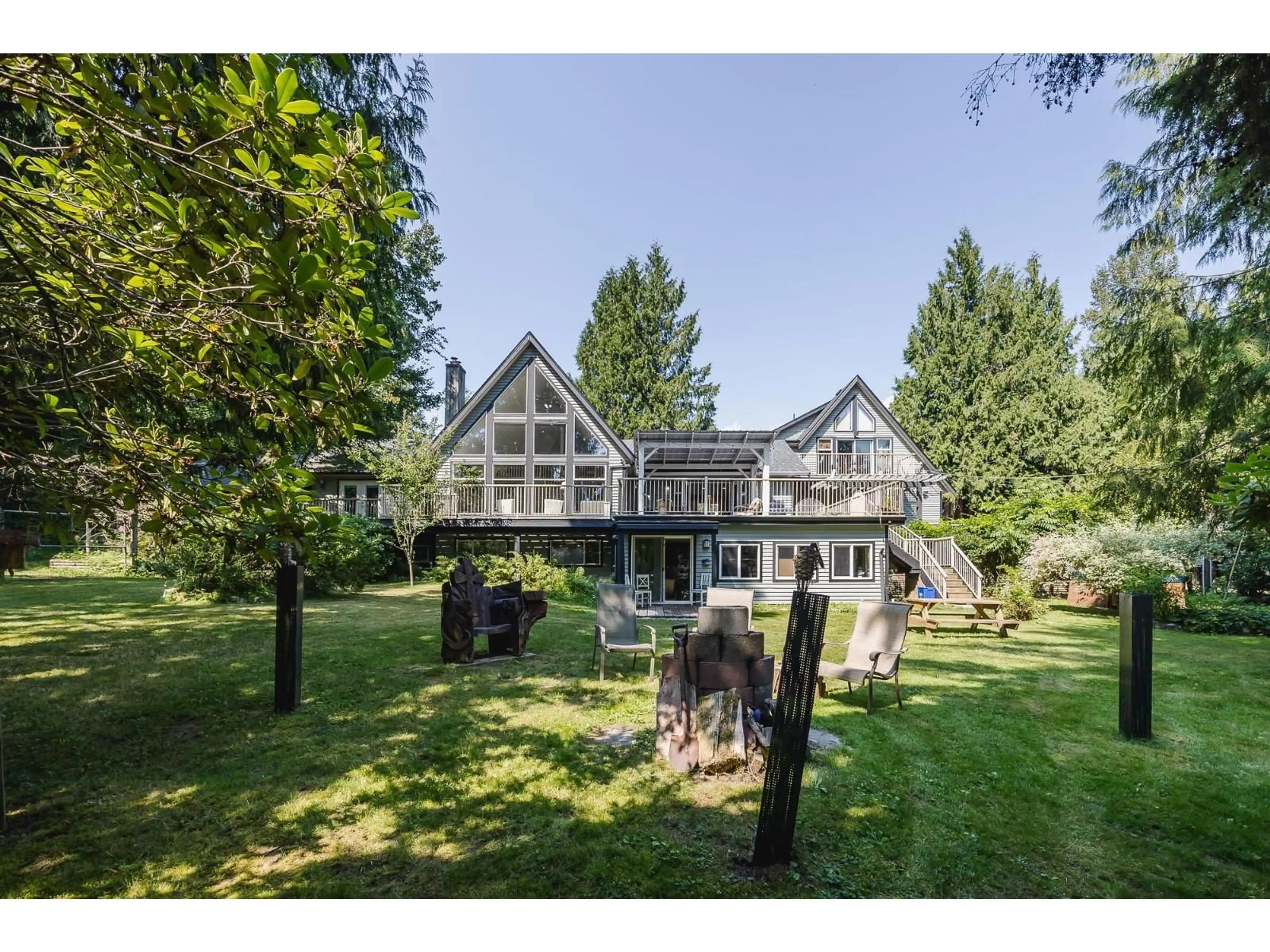 A pic from outside/outdoor area/front of a property/back of a property/a pic from drone, water/lake/river/ocean view for 11977 STAVE LAKE, Mission British Columbia V2V4J1