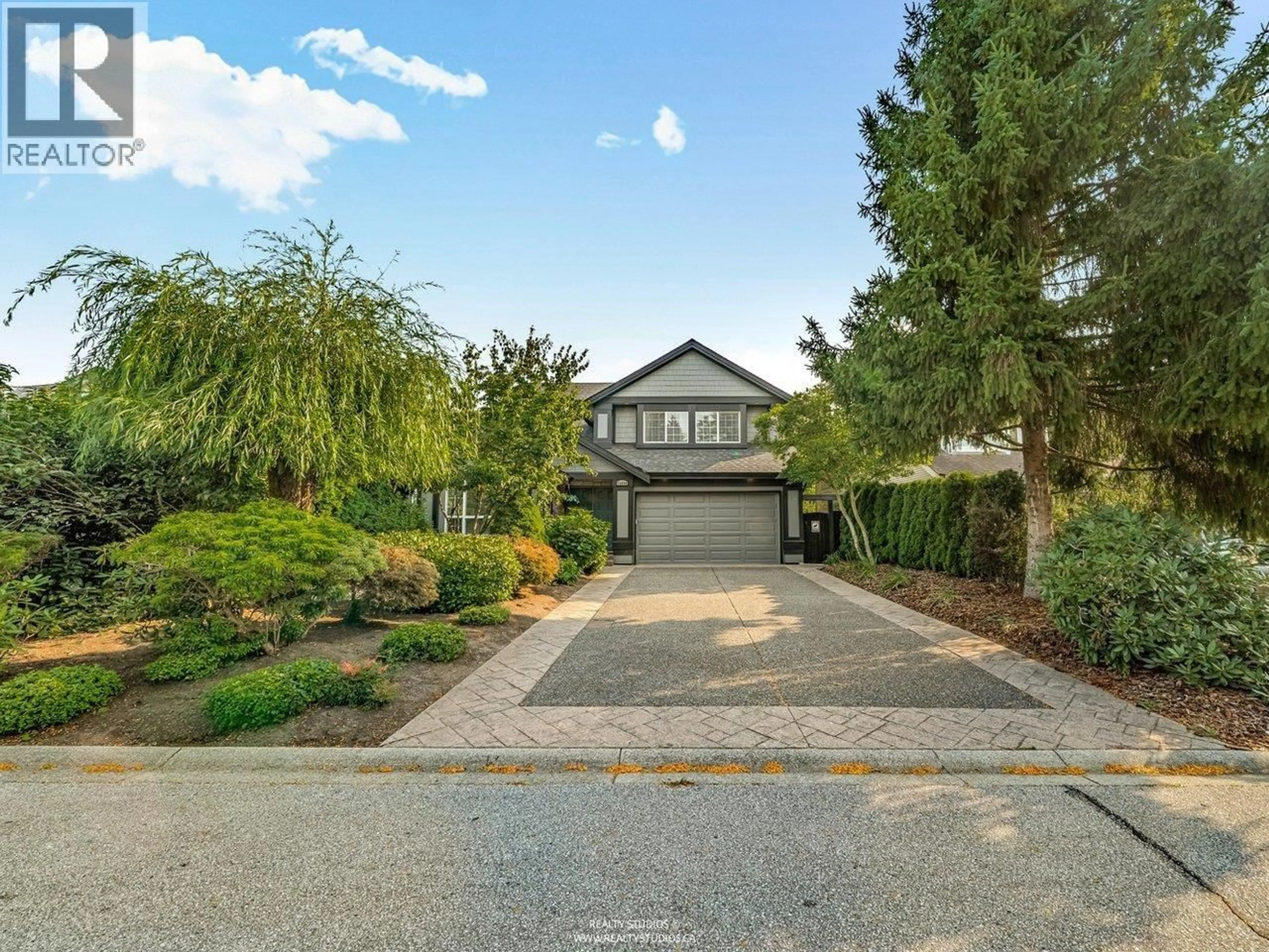 A pic from outside/outdoor area/front of a property/back of a property/a pic from drone, street for 20498 122B AVENUE, Maple Ridge British Columbia V2X1B6