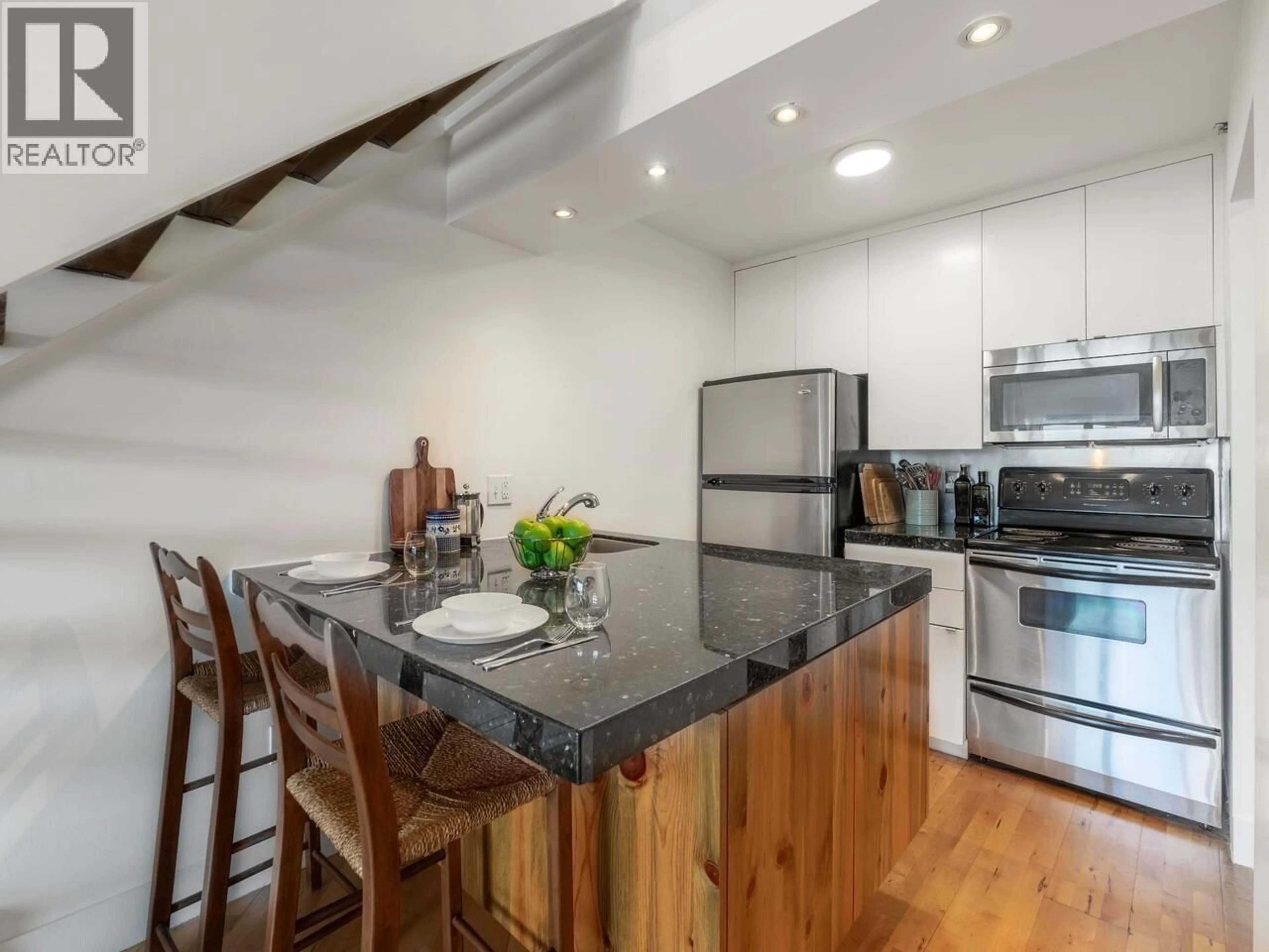 Open concept kitchen, unknown for 408 - 1549 KITCHENER STREET, Vancouver British Columbia V5L2V8