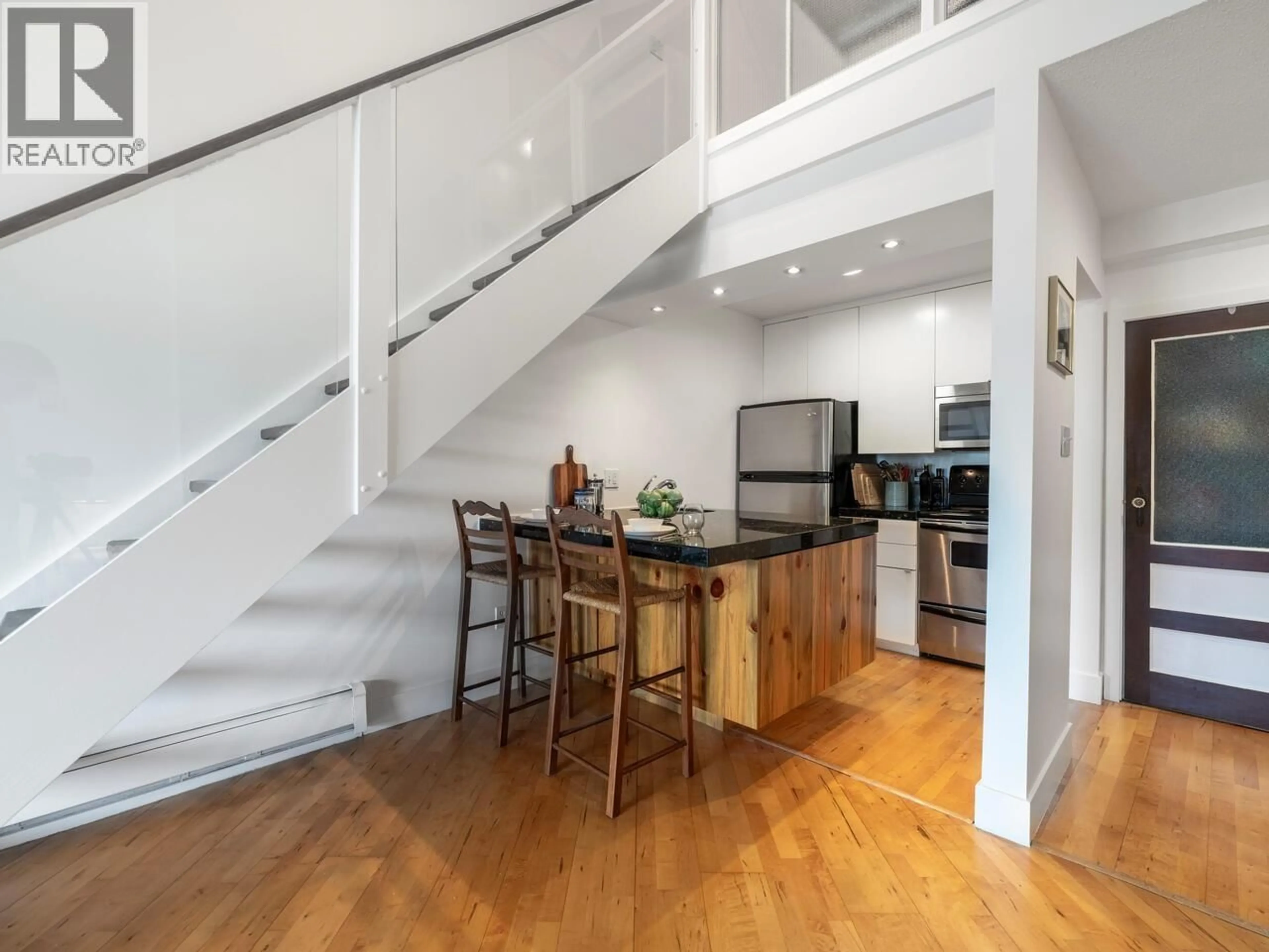 Open concept kitchen, unknown for 408 - 1549 KITCHENER STREET, Vancouver British Columbia V5L2V8